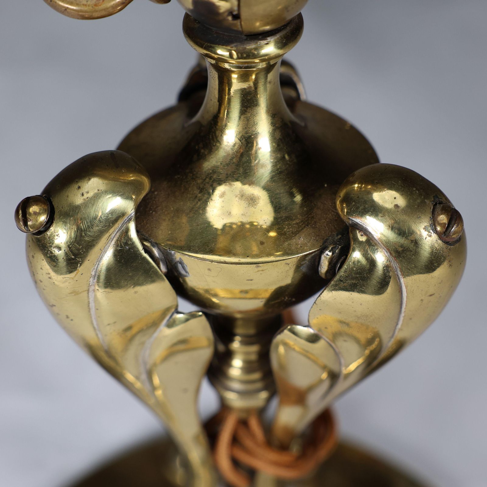 An Arts & Crafts Brass Table Lamp Tulip Shaped With Heart Cut Outs To The Base photo vinterior