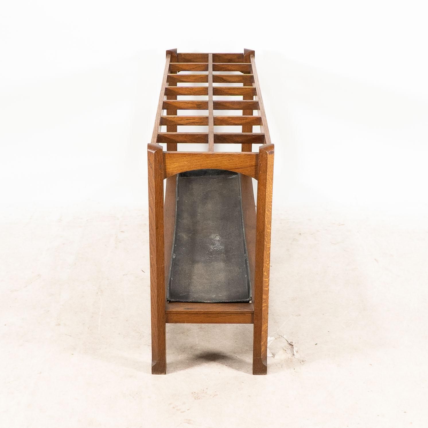 An Arts And Crafts Oak Stick And Umbrella Stand With Fourteen Sections photo Home Decor