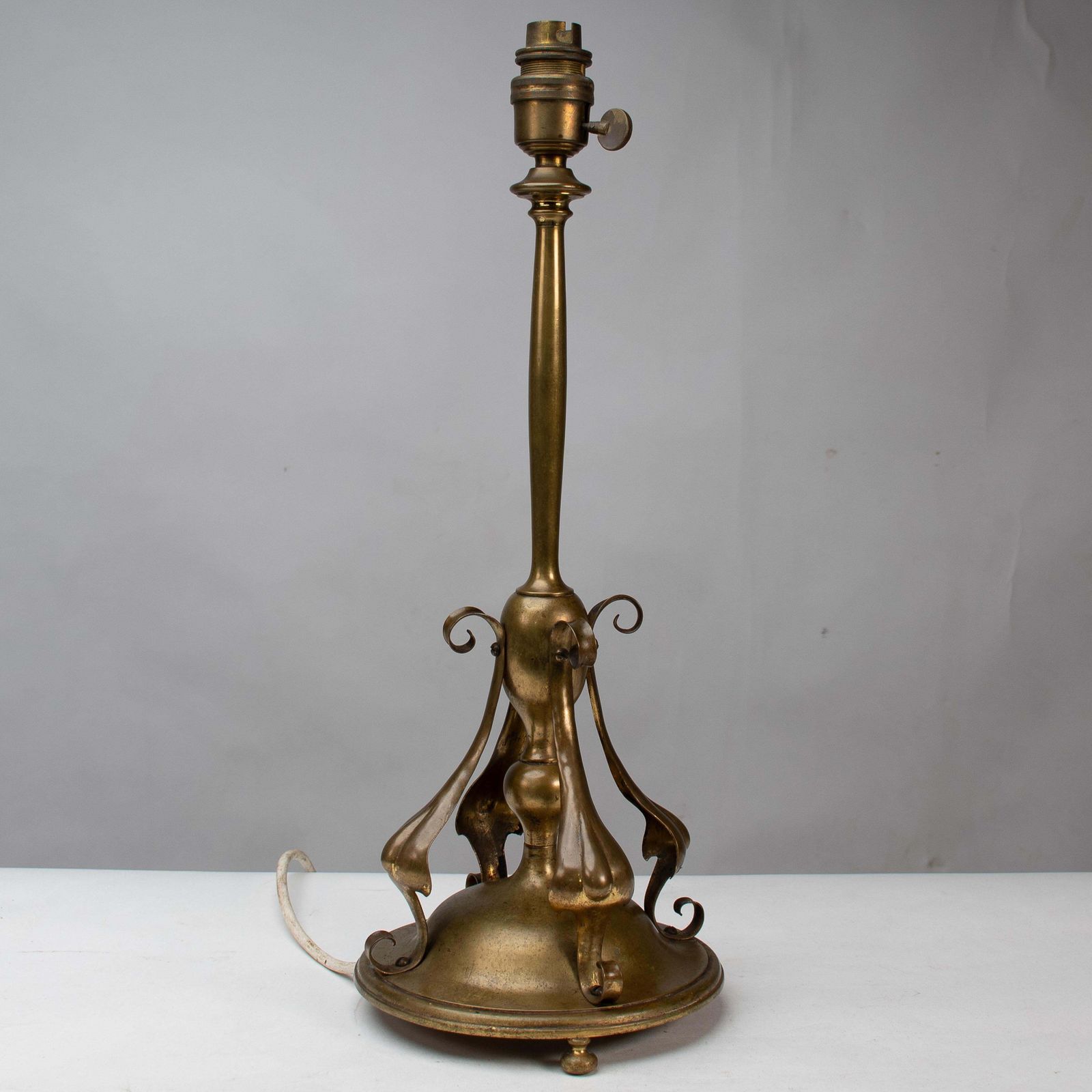 An Arts And Crafts Brass Table Lamp In The Style Of C F A Voysey photo for sale