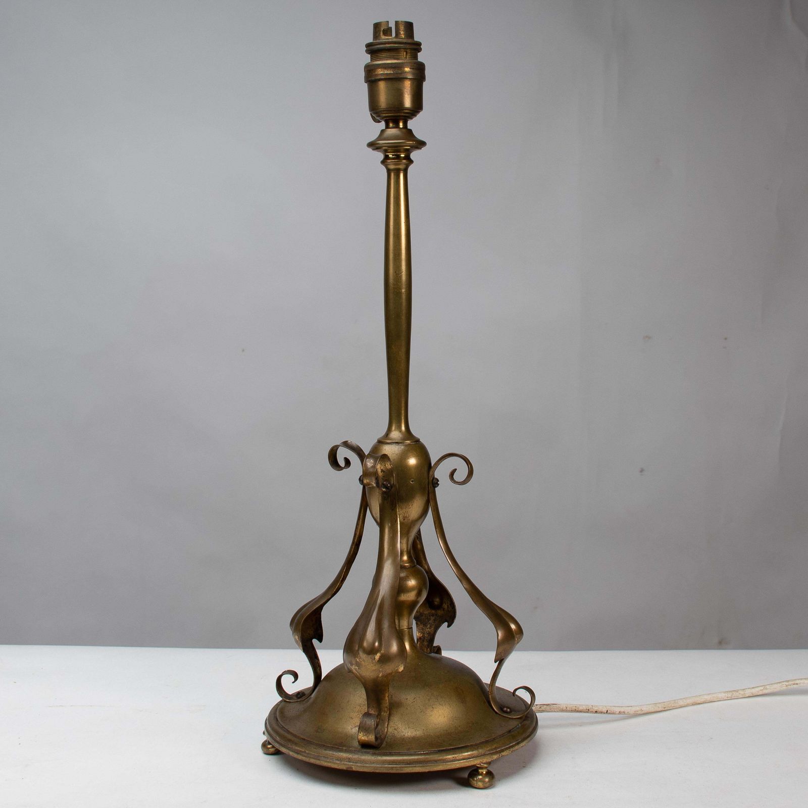 An Arts And Crafts Brass Table Lamp In The Style Of C F A Voysey photo 1224.0