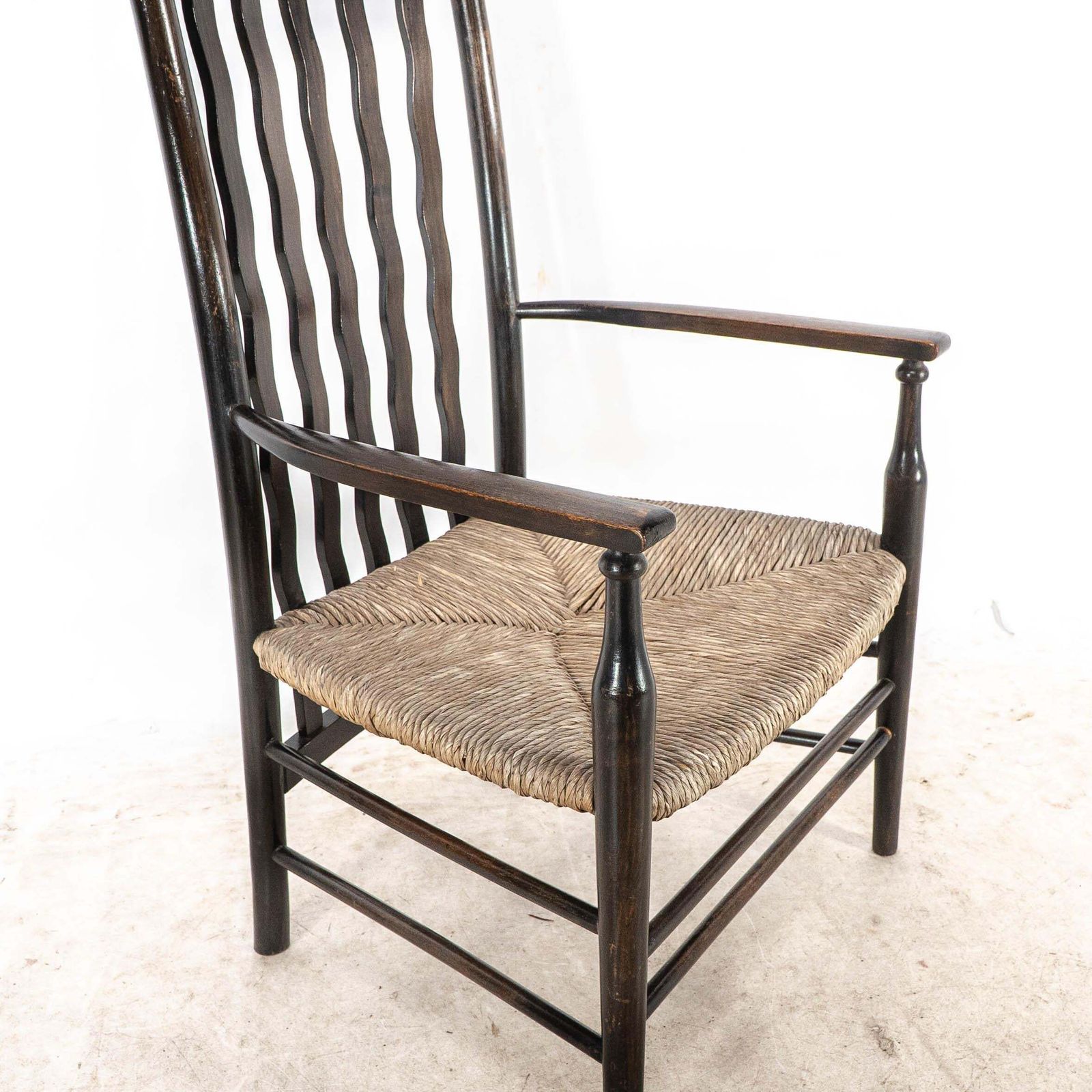 photo vinterior Liberty & Co. An Arts & Crafts Rush Seat Armchair With Wavy Shaped Back Slats
