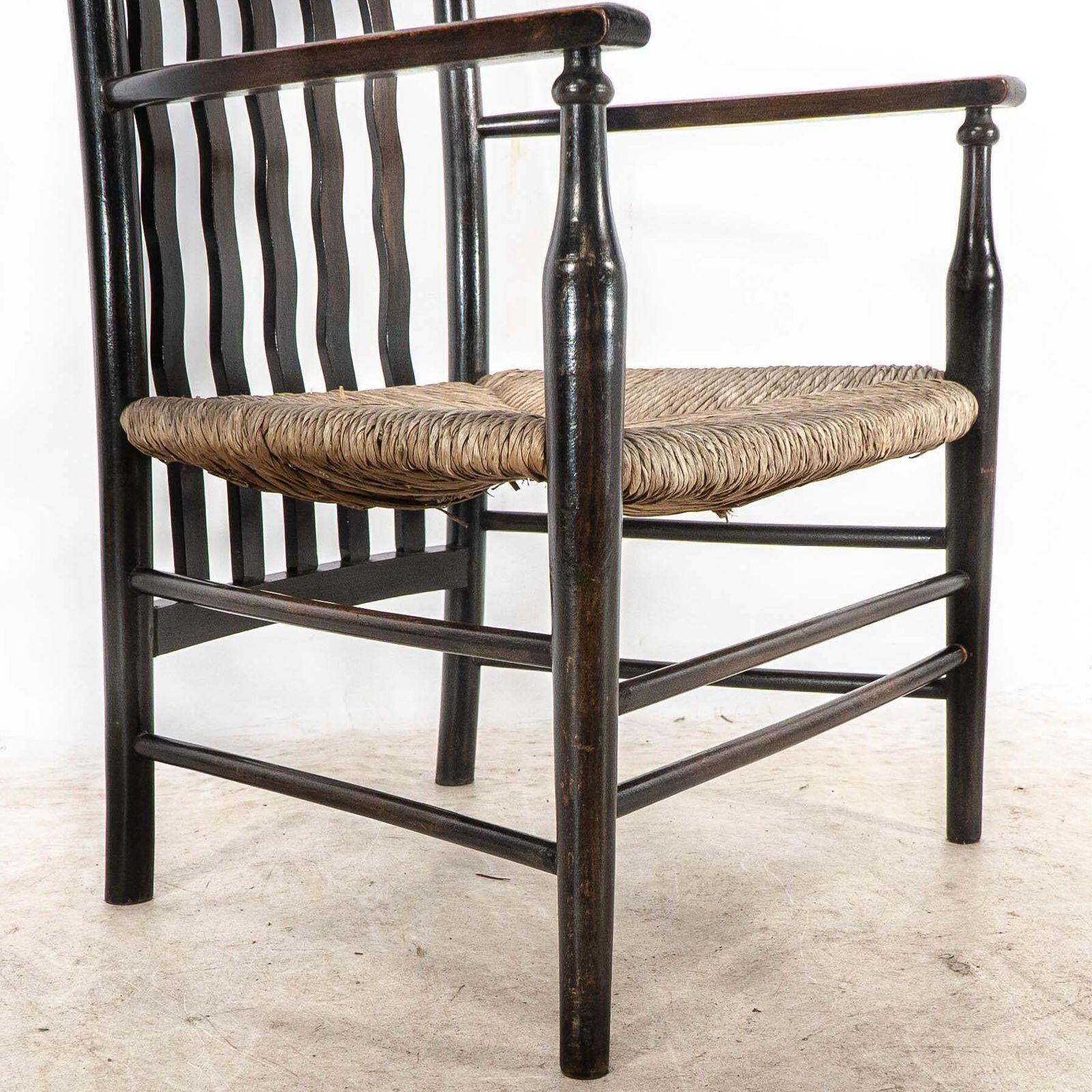 photo buy Liberty & Co. An Arts & Crafts Rush Seat Armchair With Wavy Shaped Back Slats