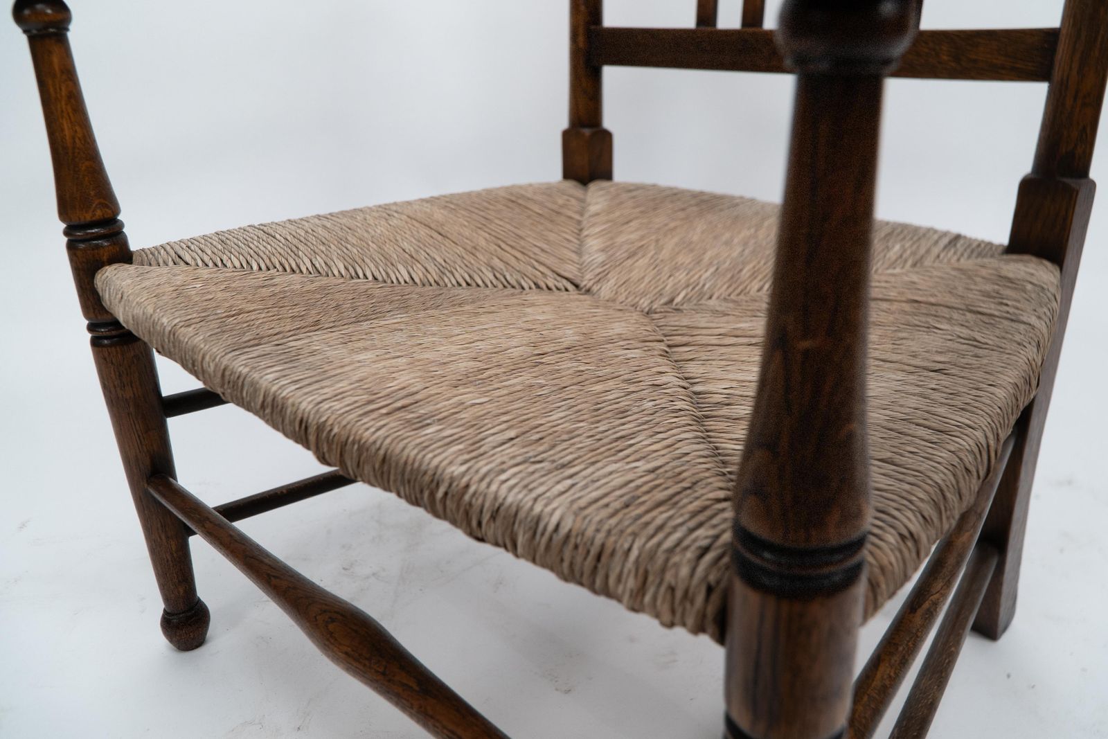 Furniture Liberty And Co. An Arts And Crafts Rush Seat Armchair photo