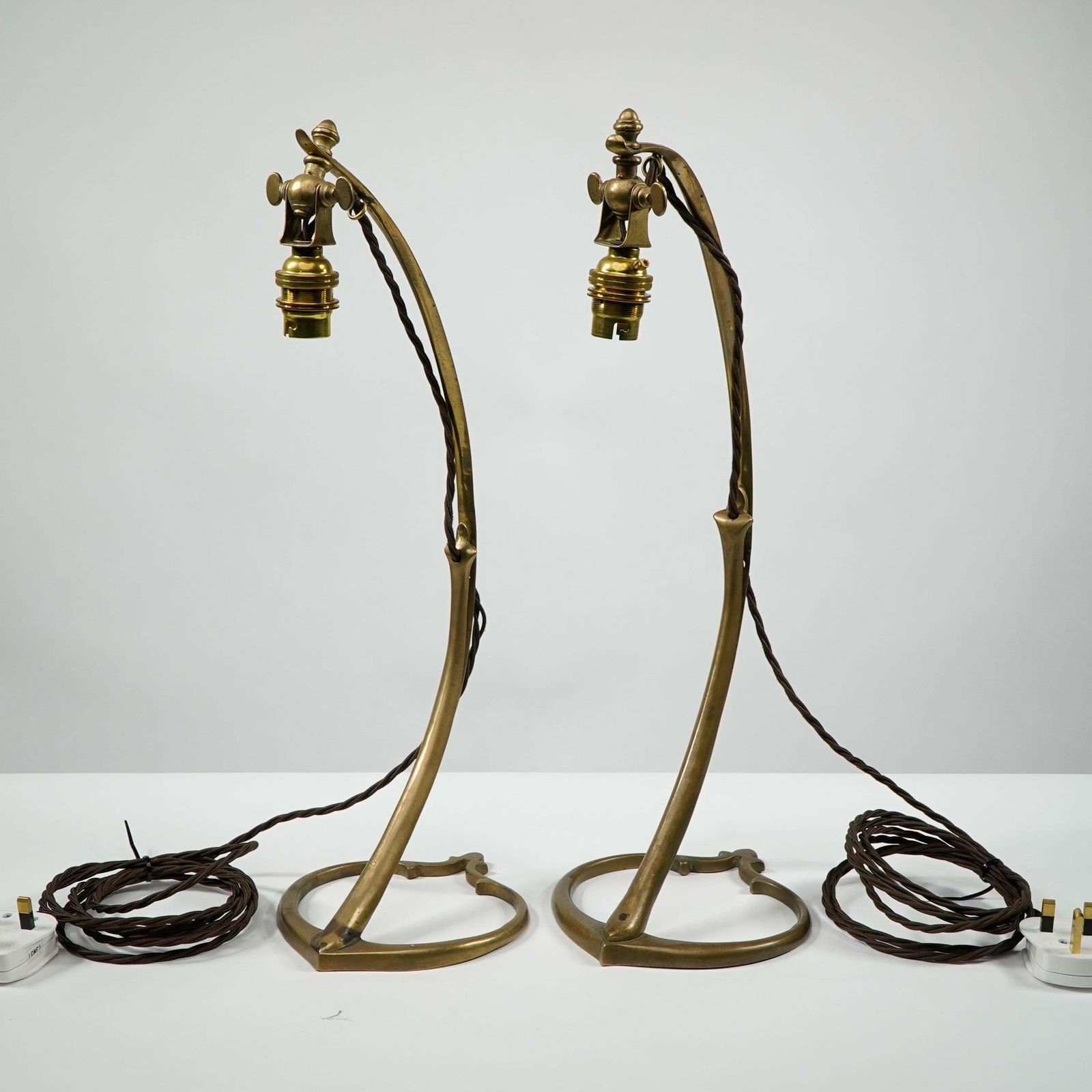 Was Benson. A Pair Of Tall Swan Necked Table Lamps With Heart Shaped Base photo furniture