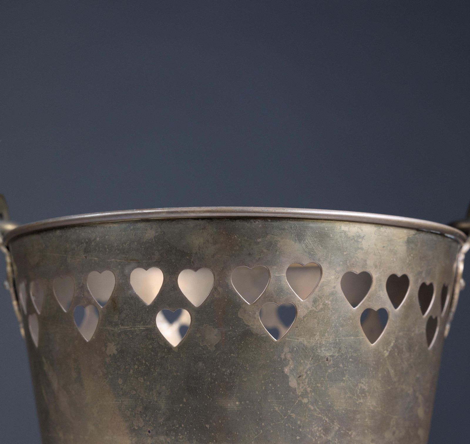 photo furniture An Arts & Crafts Brass Champagne Bucket With Pierced Voysey Style Heart Decor