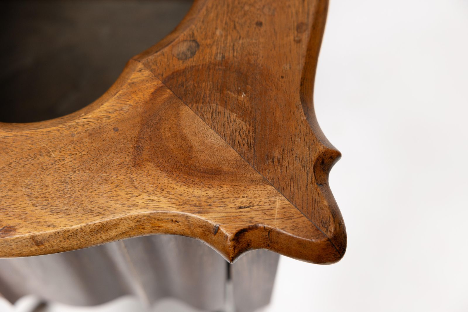 photo furniture An Arts And Crafts Walnut Plant Stand With A Shaped Top And Ribbed Style Sides