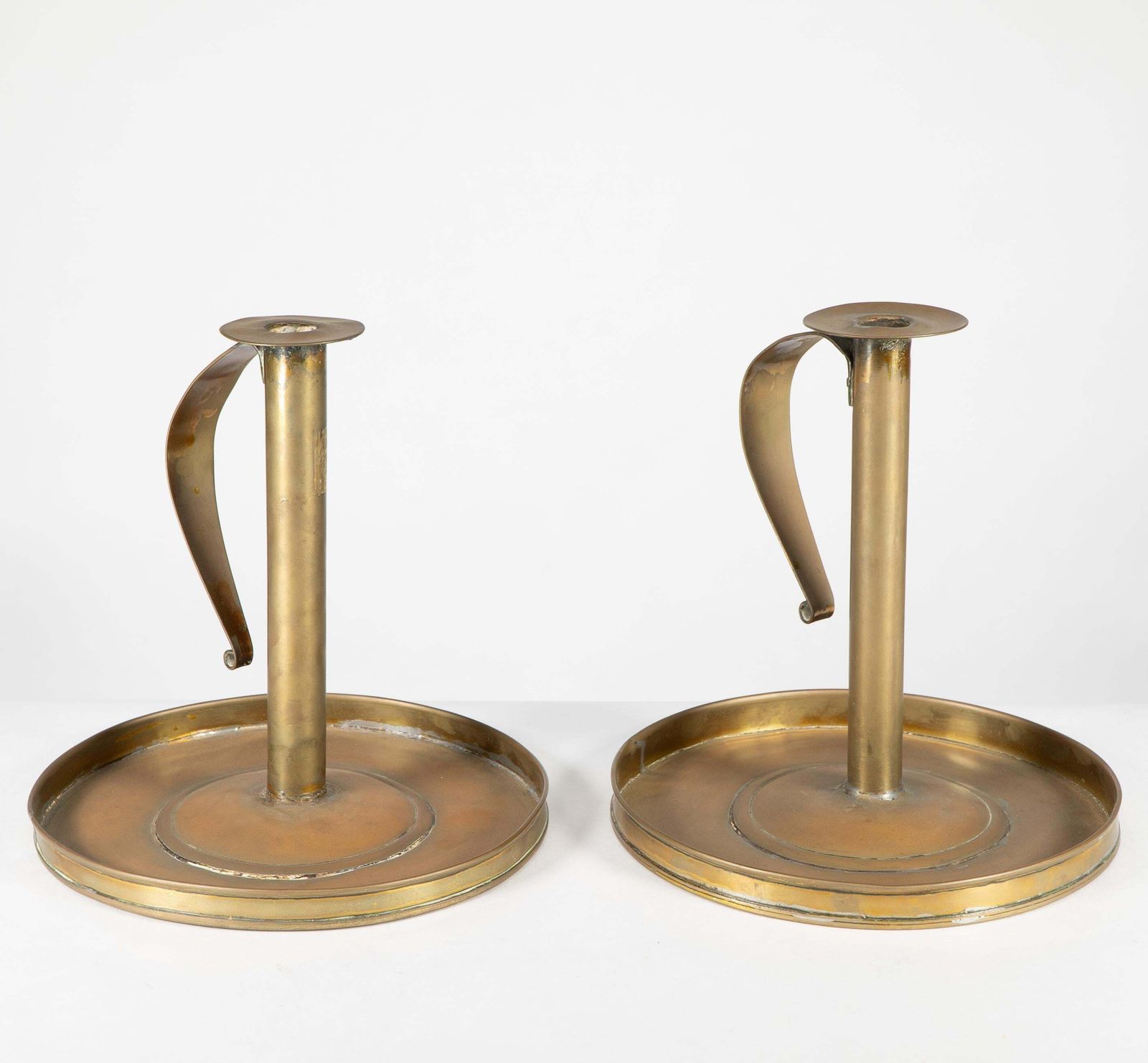 A Pair Of Scottish School Arts & Crafts Brass Candlesticks W Circular Drip Trays photo for sale