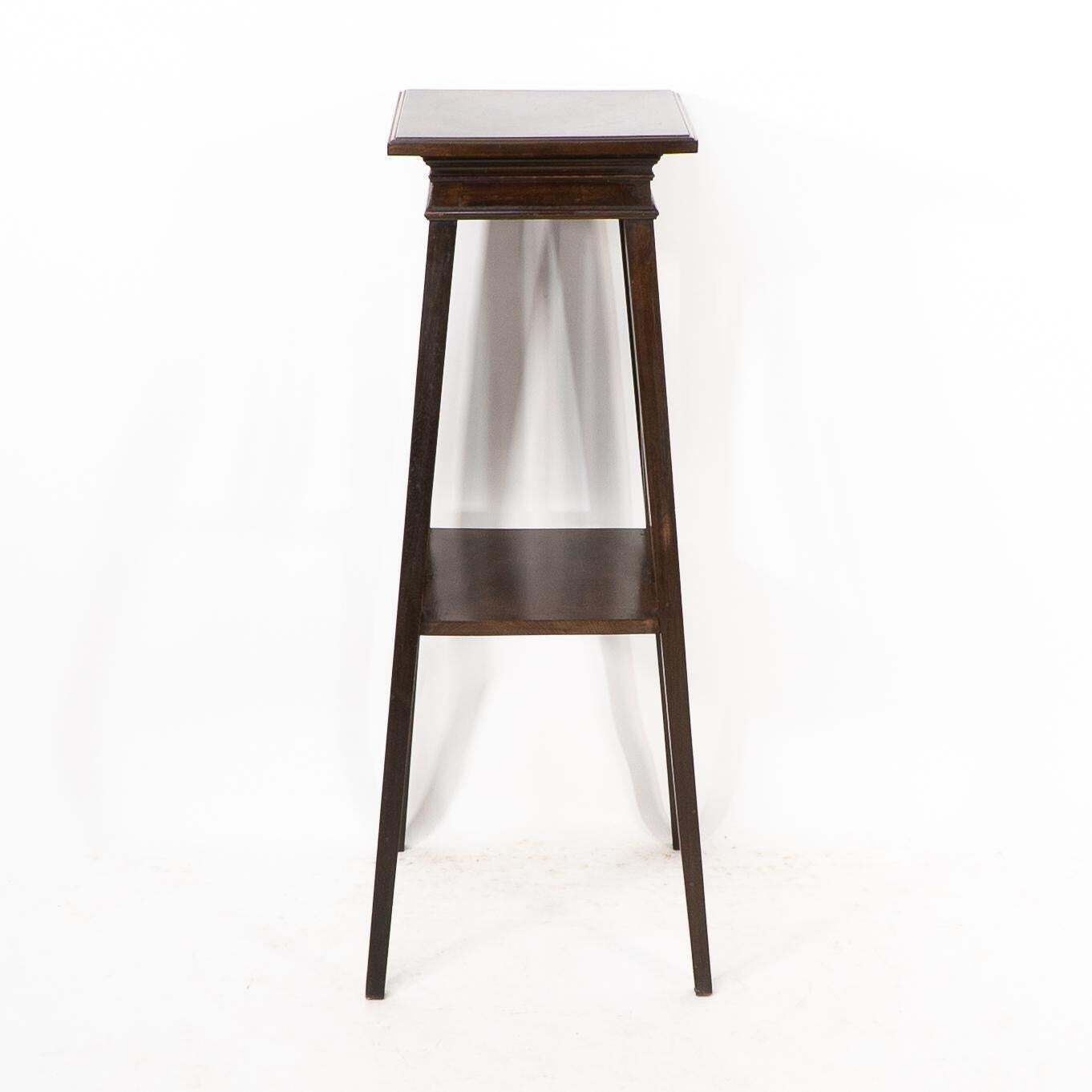 Liberty & Co In The Style Of E W Godwin. An Anglo Japanese Two Tier Plant Stand photo for sale