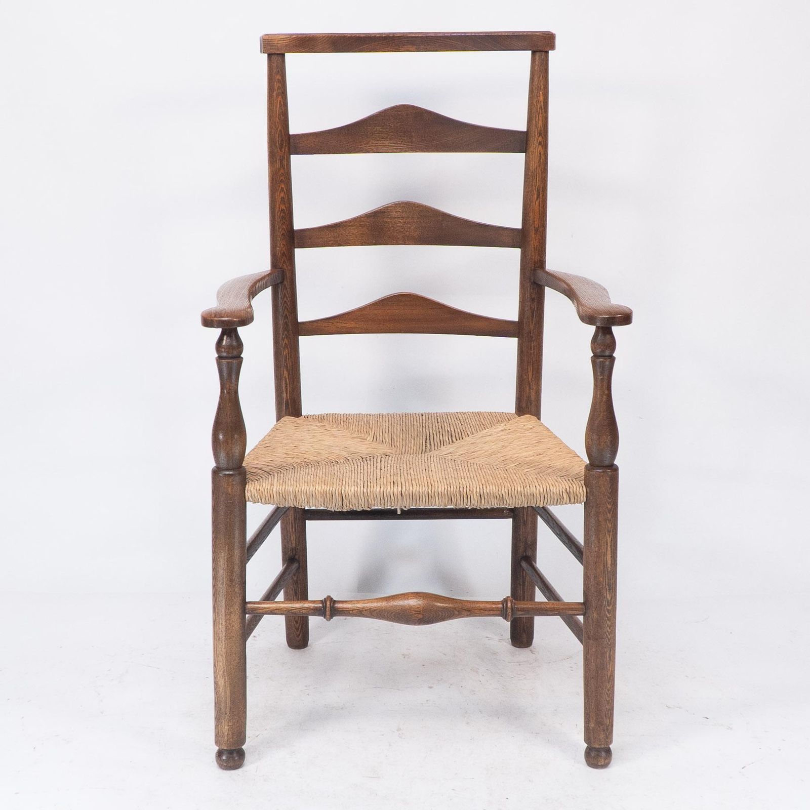 C R Ashbee Attr. An Arts & Crafts Oak Ladder Back Armchair With Re Rushed Seat photo furniture