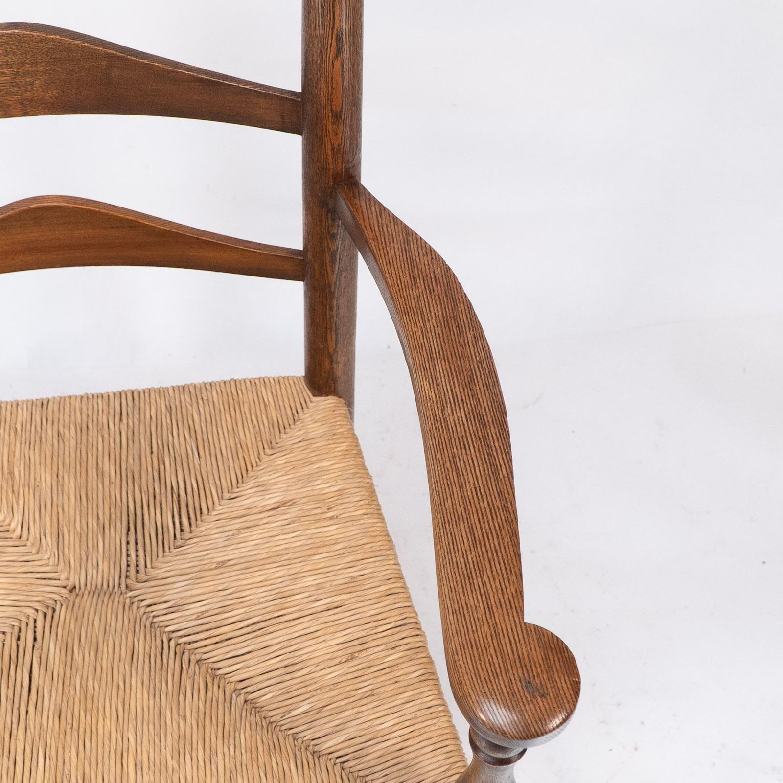 photo for sale C R Ashbee Attr. An Arts & Crafts Oak Ladder Back Armchair With Re Rushed Seat