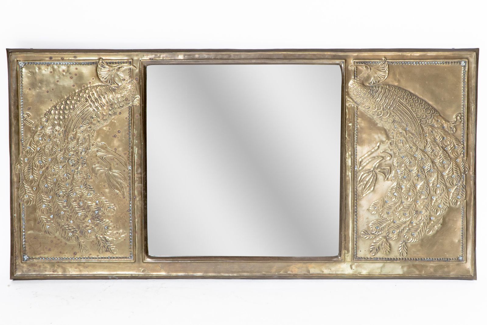 An Aesthetic Movement Brass Mirror With Stylized Peacocks Perched On A Branch photo for sale