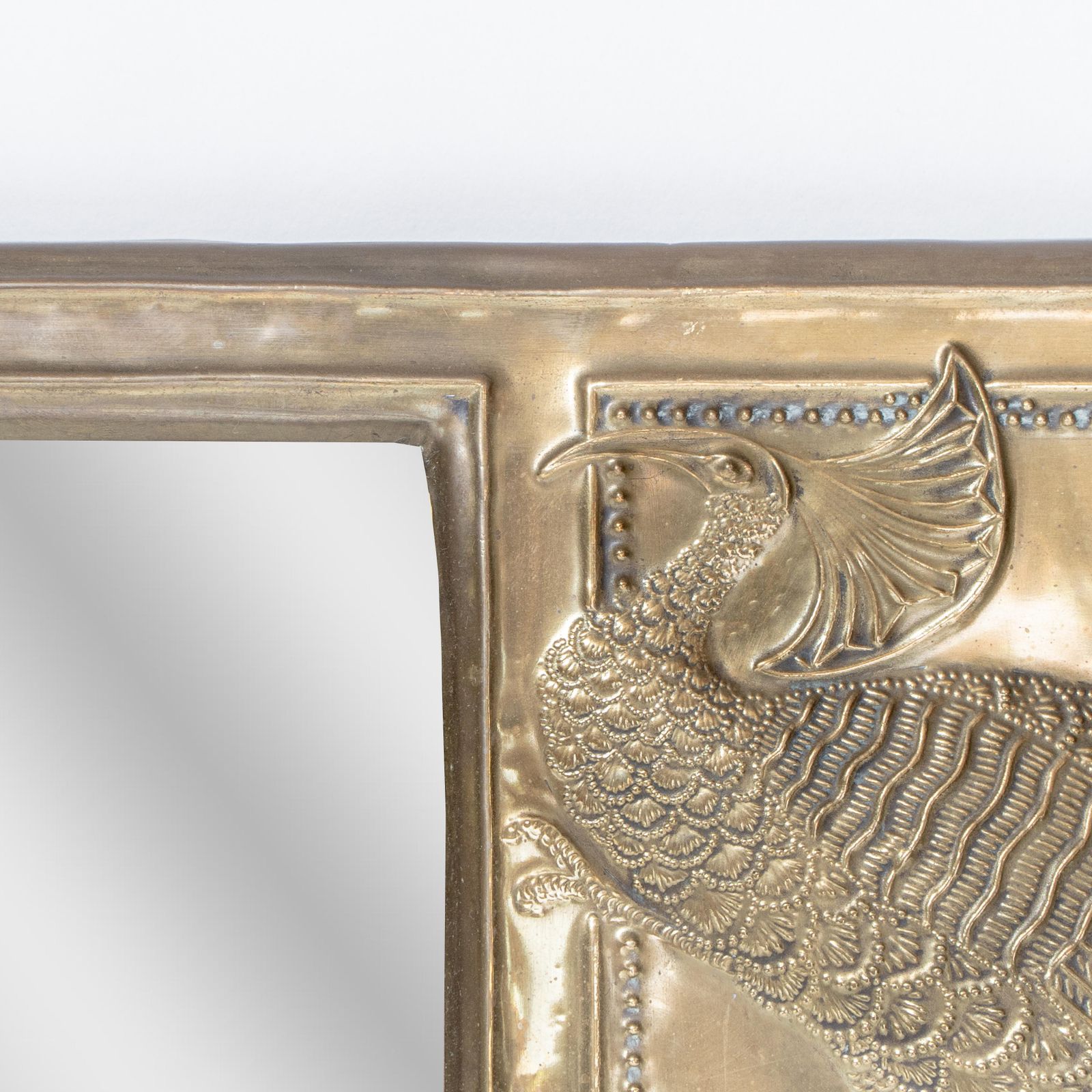 photo furniture An Aesthetic Movement Brass Mirror With Stylized Peacocks Perched On A Branch