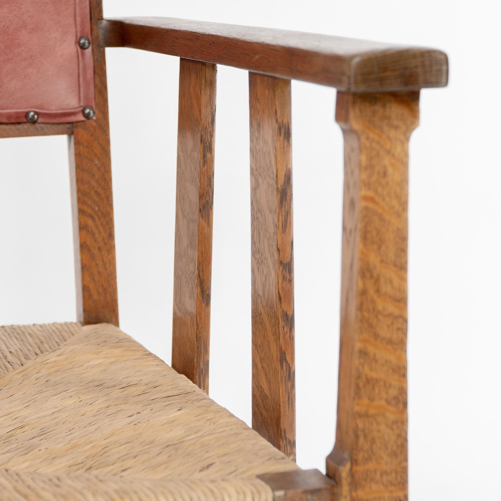 Furniture Liberty & Co. An Arts & Crafts Rush Seat Armchair With A Shaped Back photo