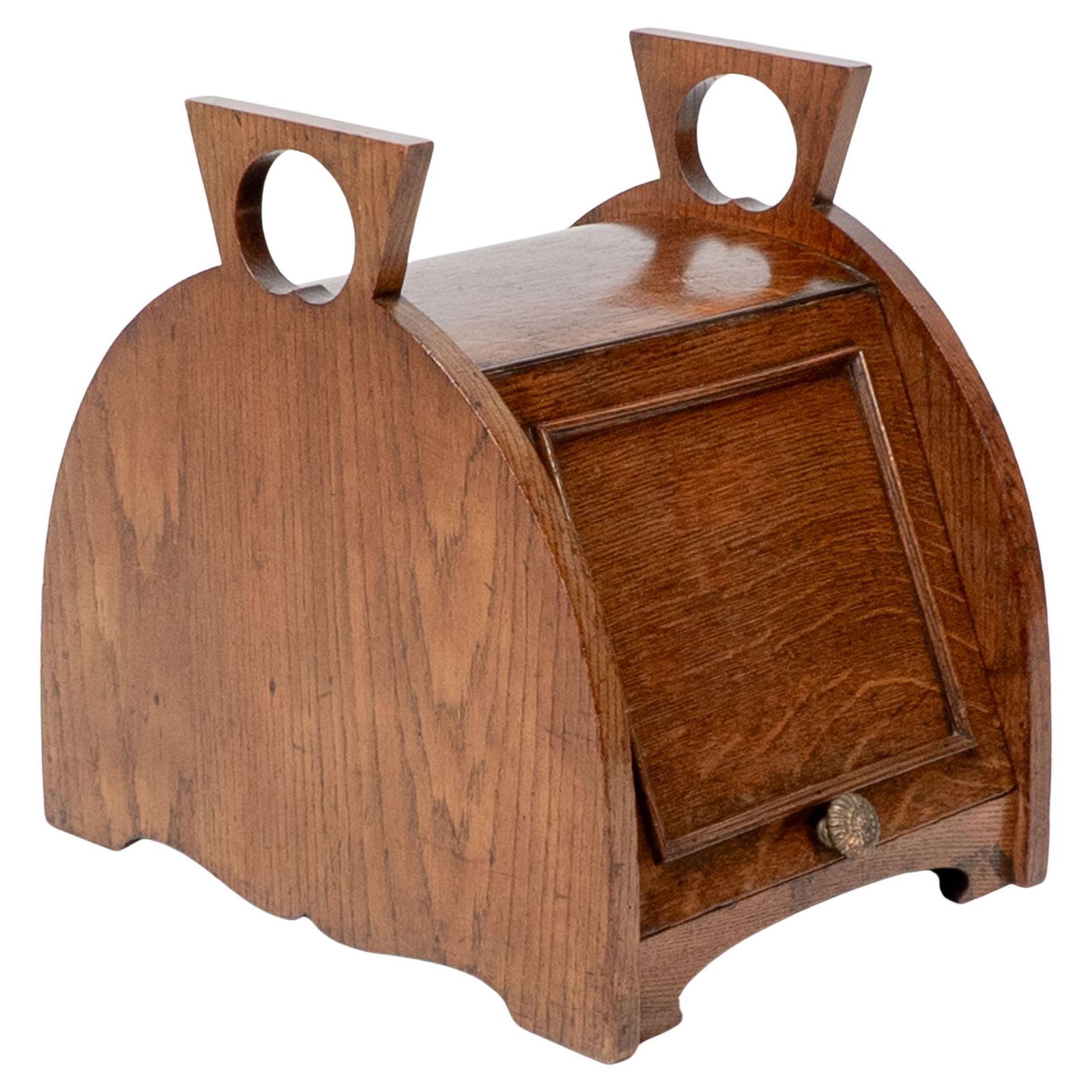 W J Neatby Attri. An Arts & Crafts Oak Coal Box With Stylized Carrying Handles