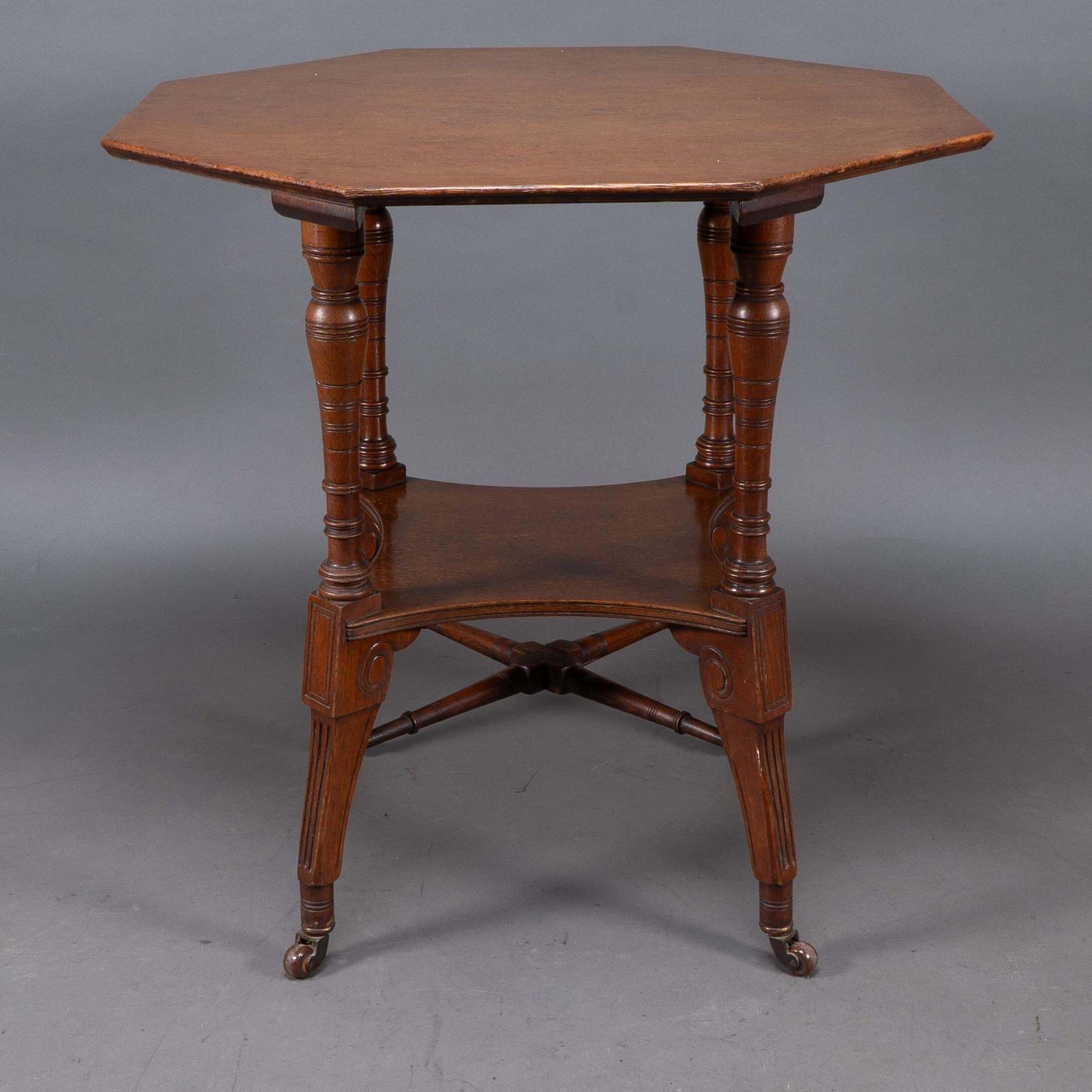 Jas Shoolbred. An Aesthetic Movement Walnut Octagonal Center Table photo vinterior