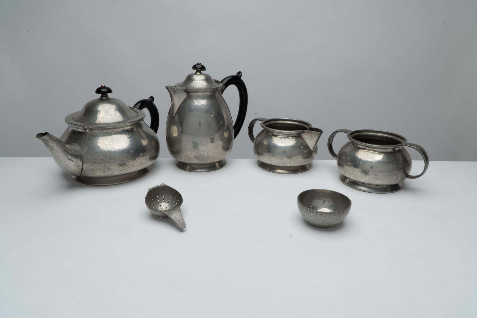 Liberty And Co. An Arts And Crafts Six Piece Pewter Tudric Tea Set photo furniture