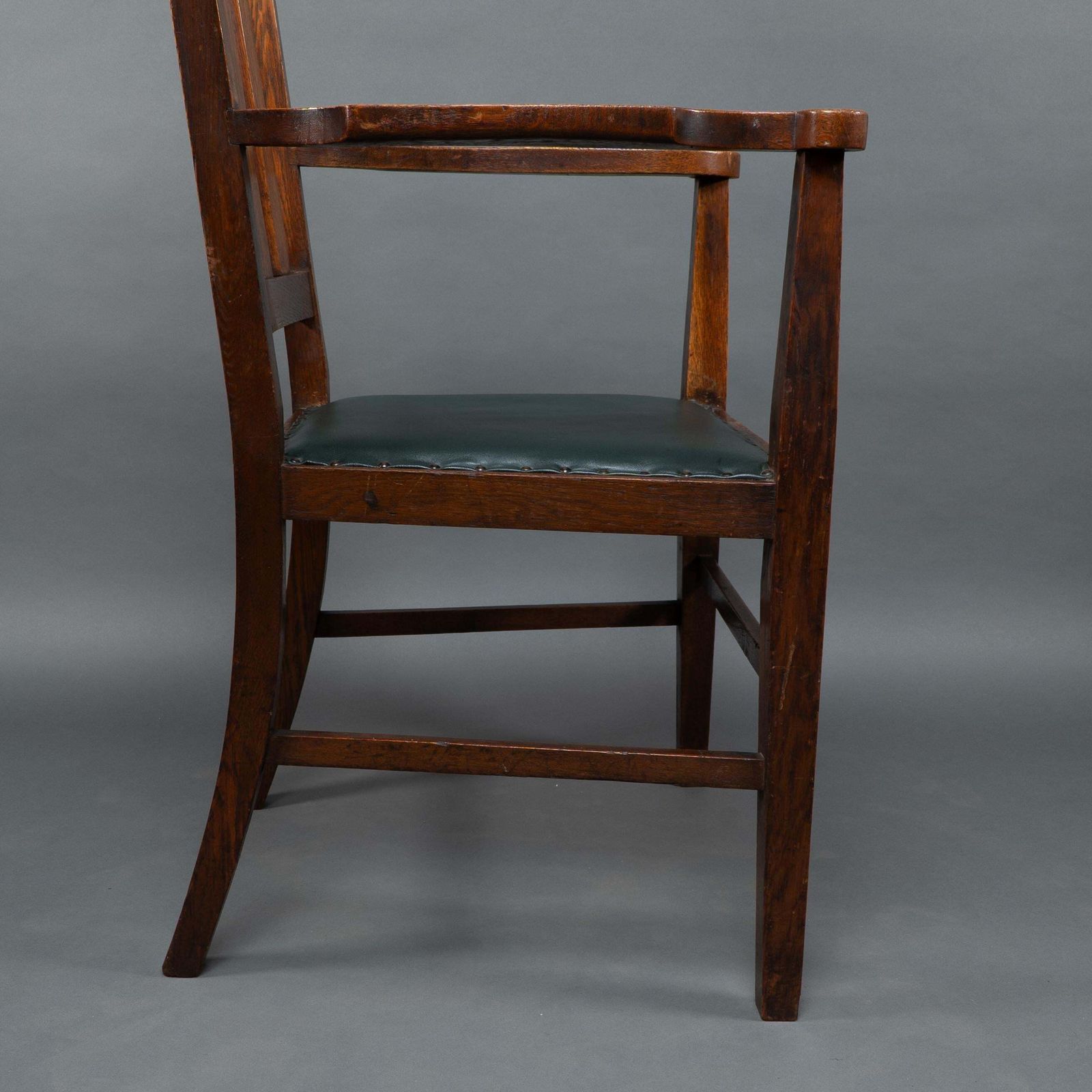 photo buy Liberty & Co Attributed. An Arts & Crafts Oak Armchair With Inlaid Royal Crown