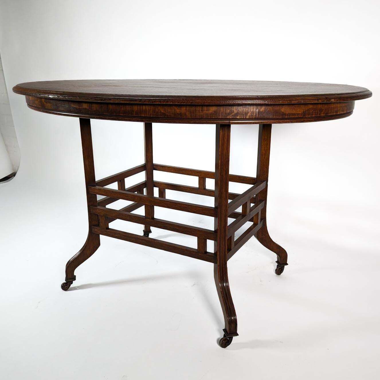 Lambs Of Manchester, Stamped Lambs. A Rare Anglo Japanese Oak Oval Centre Table photo vintage