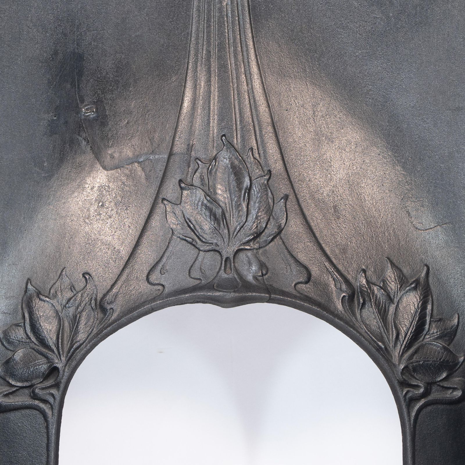 photo furniture Arts & Crafts Cast Iron Fireplace With Curved Sides & Stylized Floral Decoration