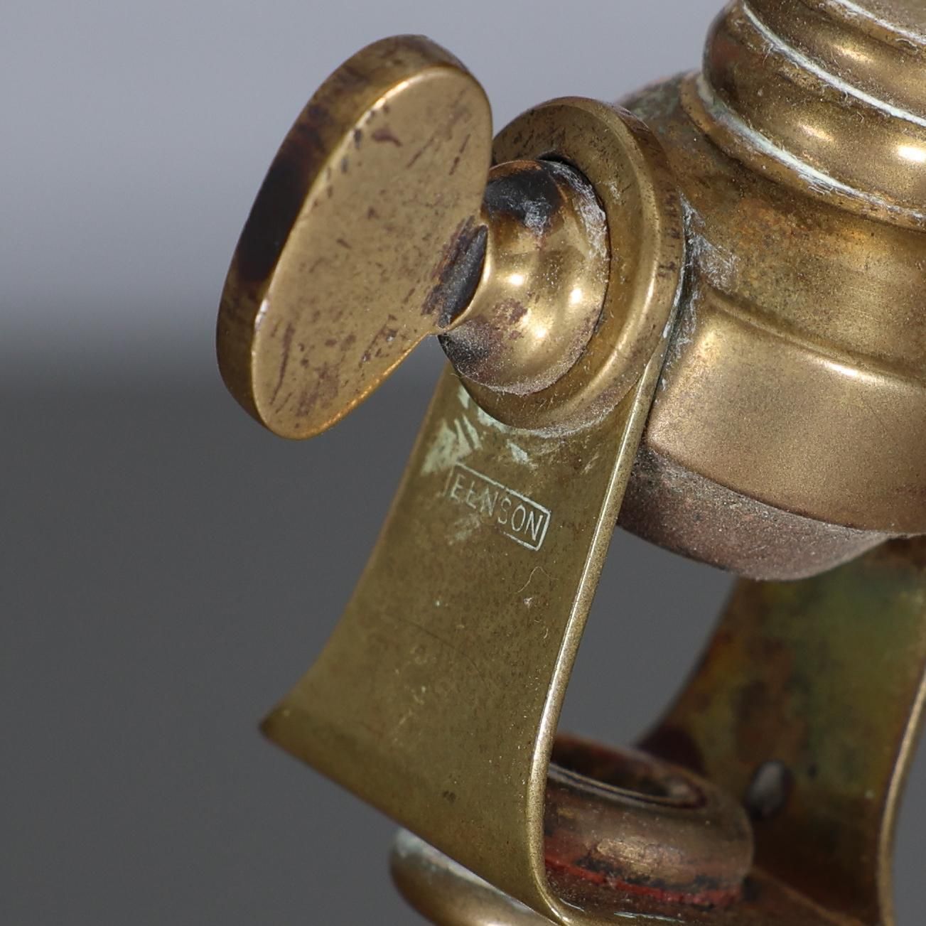 3500.0 Was Benson. A Pair Of Arts & Crafts Brass Table Lamps With Heart Shaped Bases photo