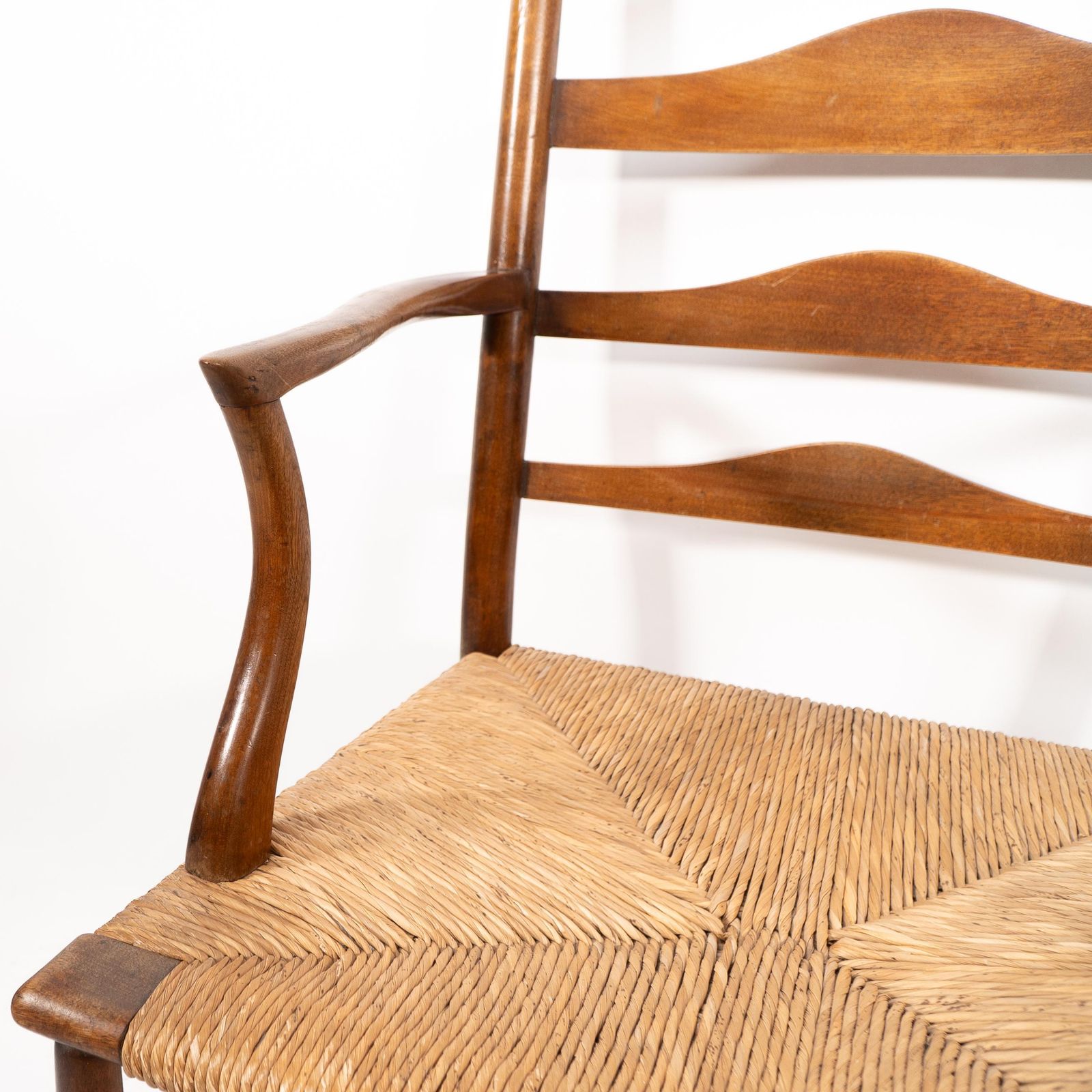 photo for sale C R Ashbee. An Arts And Crafts Rush Seat Ladder Back Armchair