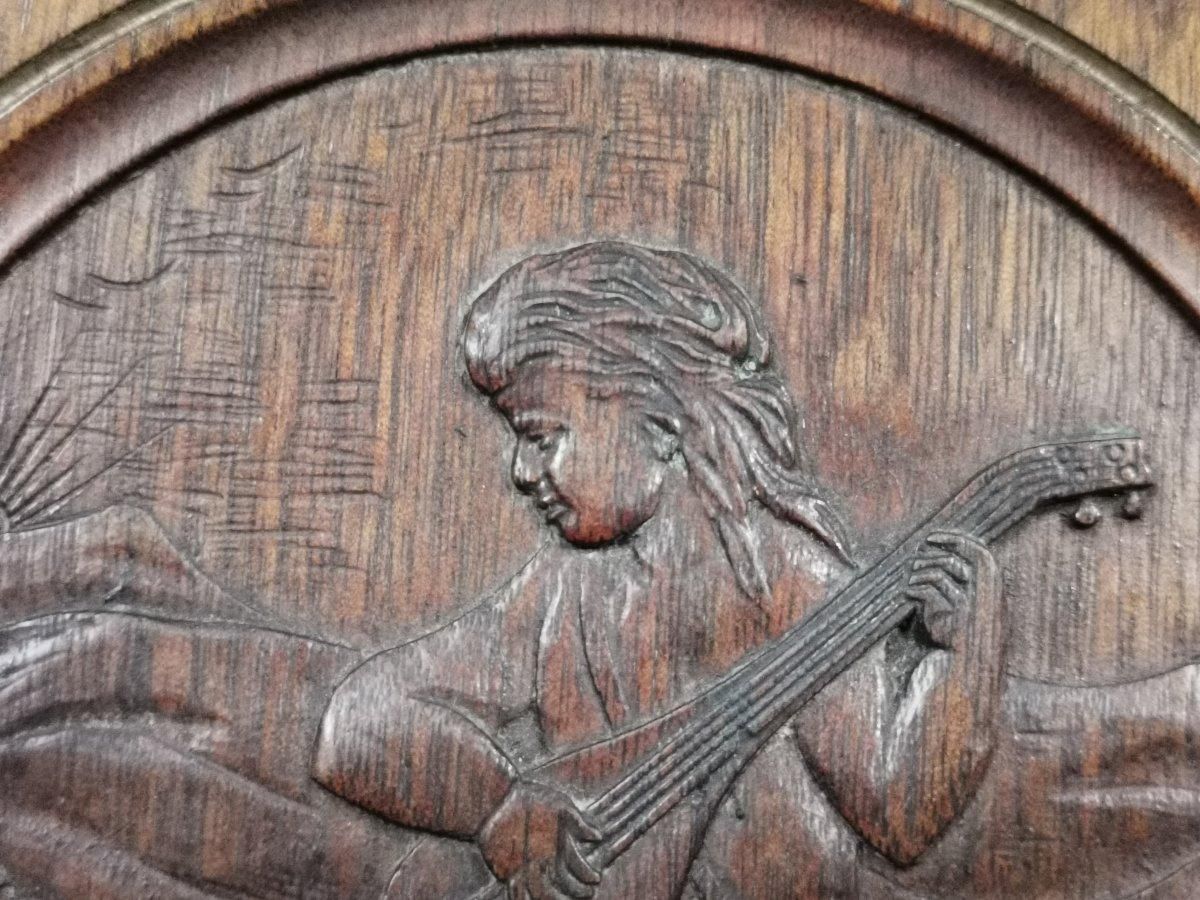 photo for sale Aesthetic Movement Side Cabinet With Carved Panels Of Putti Putti Playing Music.