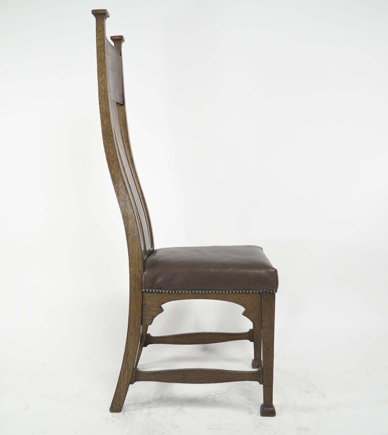 Norman & Stacey Attributed. An Arts And Crafts High With Shaped Back Oak Chair photo for sale