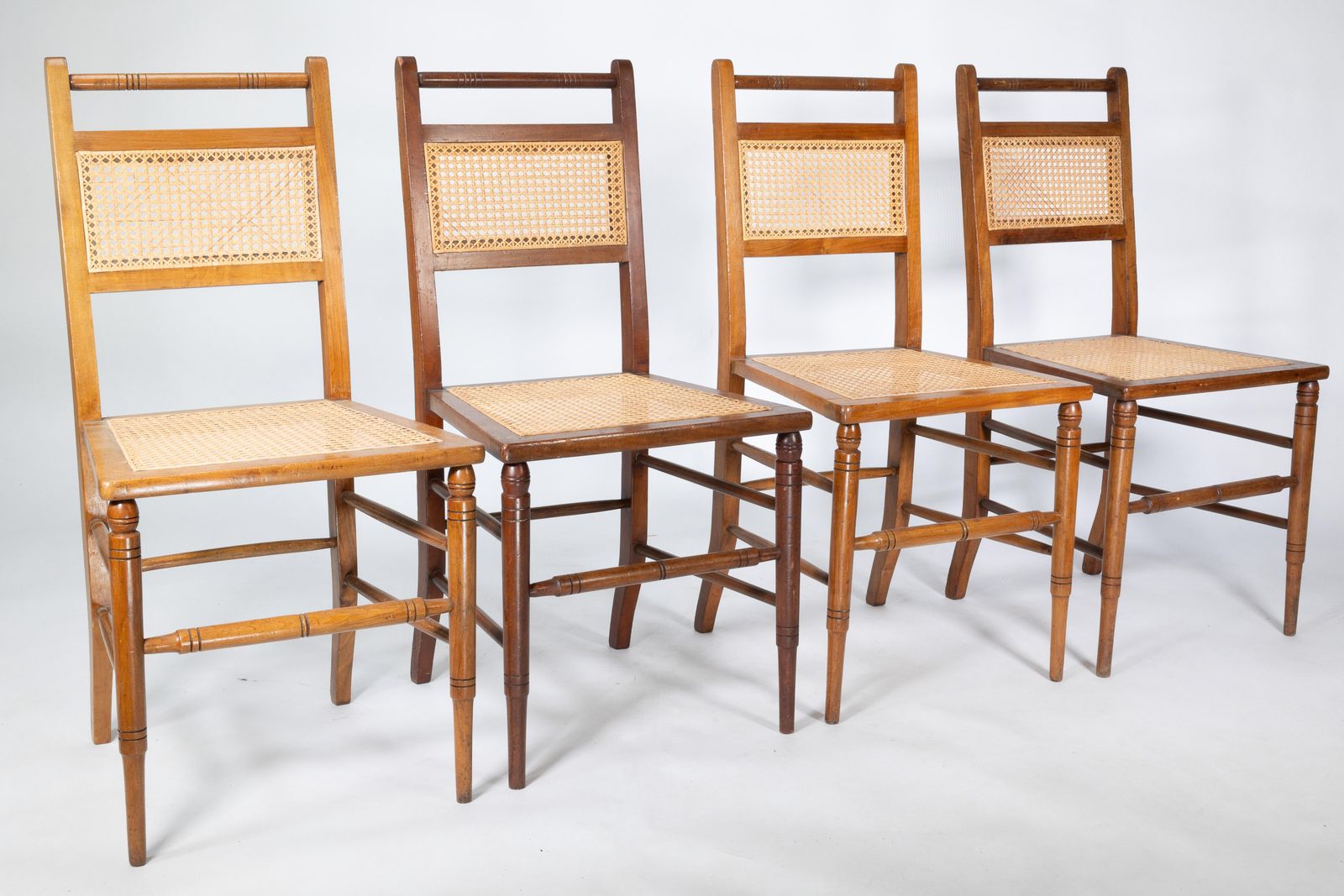 E W Godwin (Attributed). A Set Of Four Anglo Japanese Cane Seat Chairs photo for sale