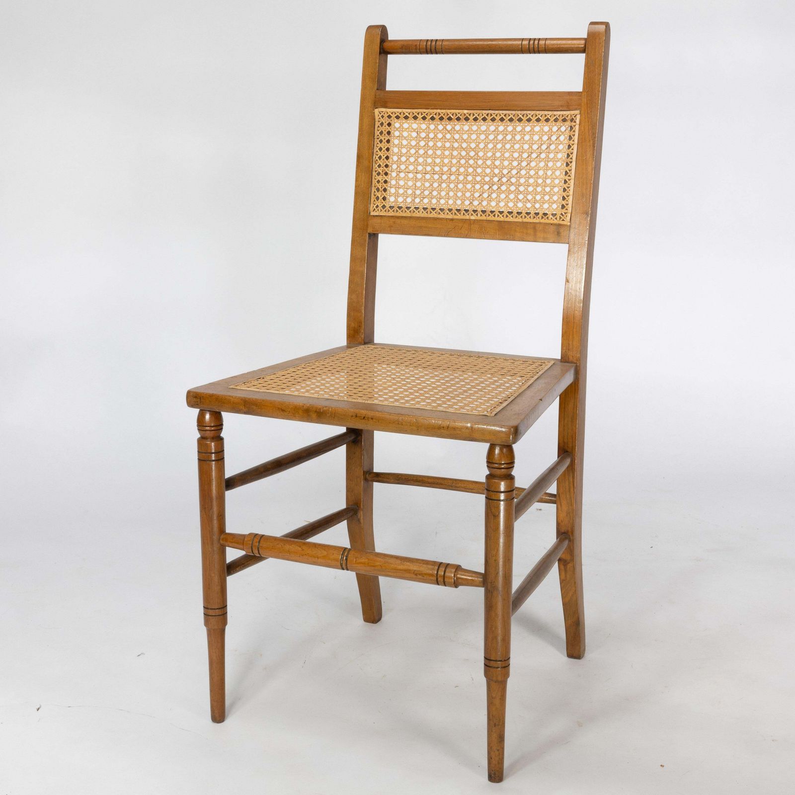 E W Godwin (Attributed). A Set Of Four Anglo Japanese Cane Seat Chairs photo vinterior