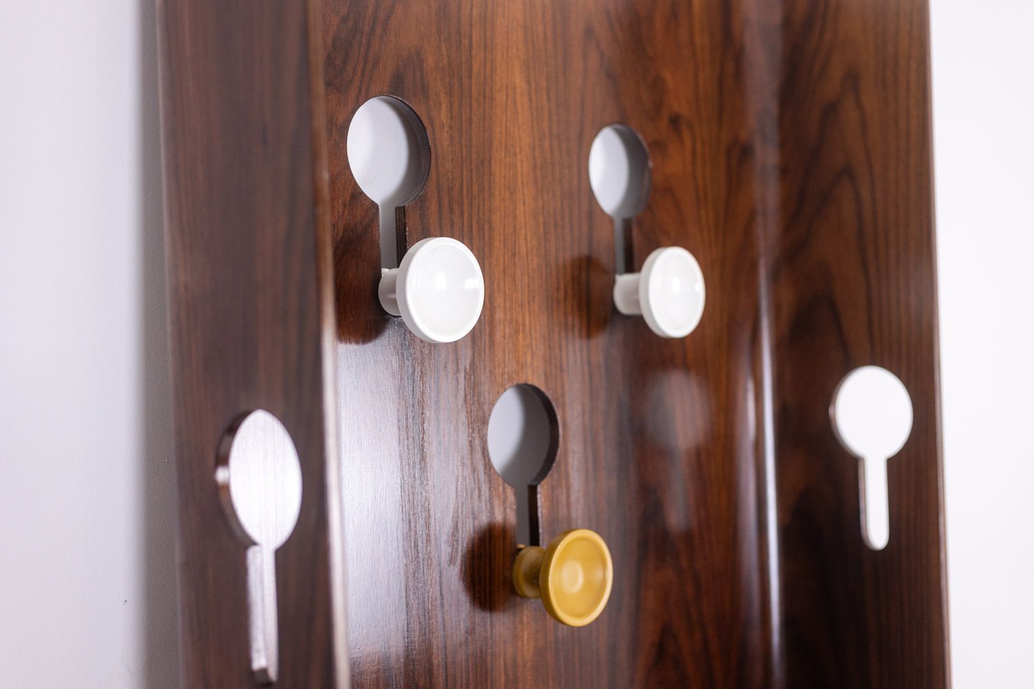 photo furniture Carlo Di Carli. Coat Rack In Rosewood Veneer. 1960s.