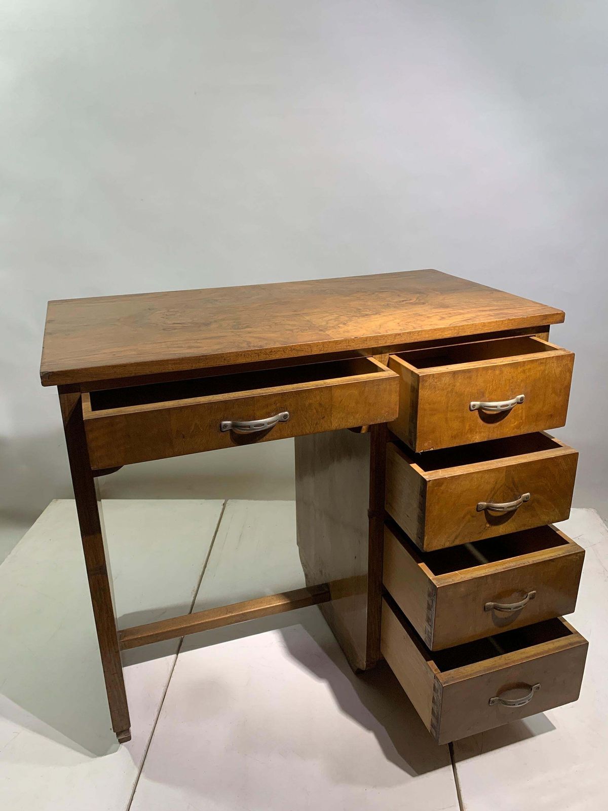 photo for sale Mid 20th Century Figured Wood Desk In Walnut With Five Drawers, Circa 1940