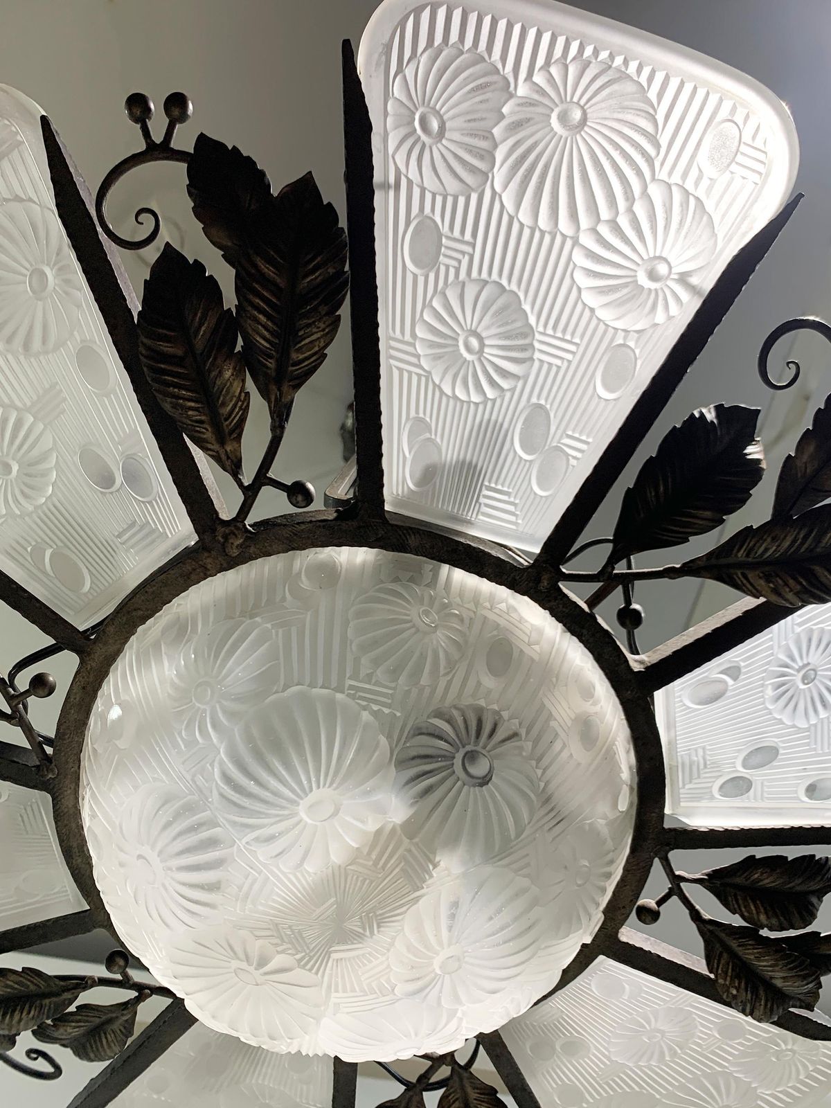 photo for sale French Art Deco Chandelier In Wrought Iron And Press Molded Glass, Circa 1930's