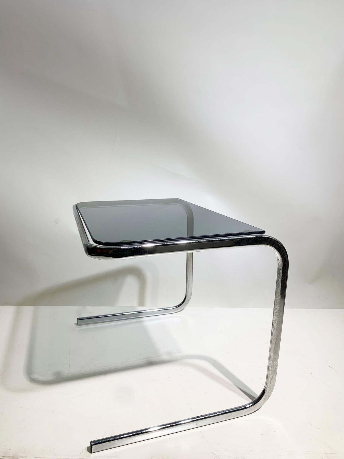 photo for sale Set Of 3 Late 20th Century Nesting Side Tables In Chrome And Smoked Glass