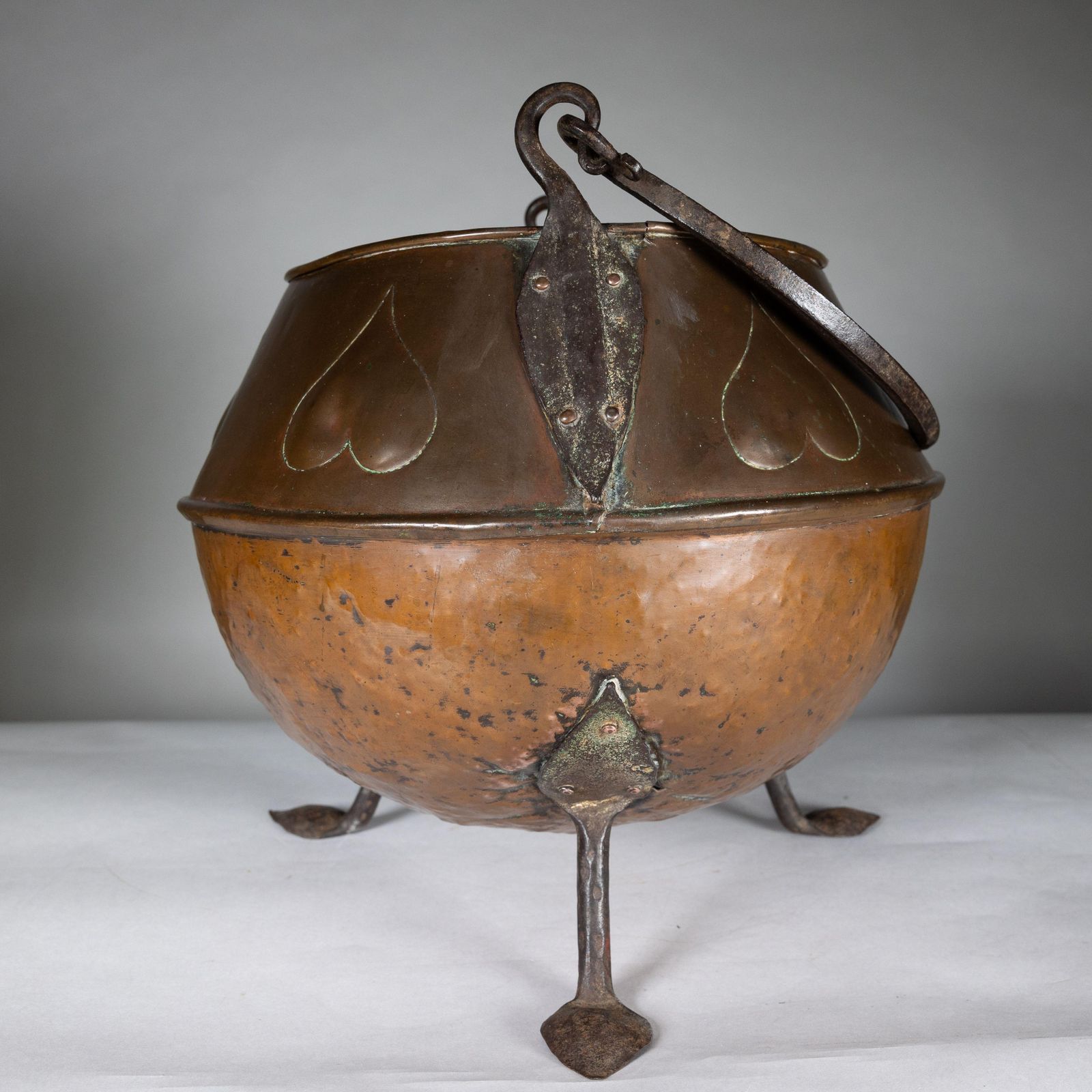 An Arts And Crafts Copper Coal Bucket With Stylized Heart Decoration photo for sale