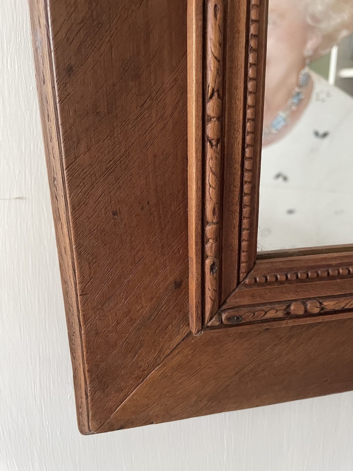 photo vinterior French Carved Cherry Wood Mirror With A Patterned Frame Featuring Beaded And Entwined Ribbon Detail.