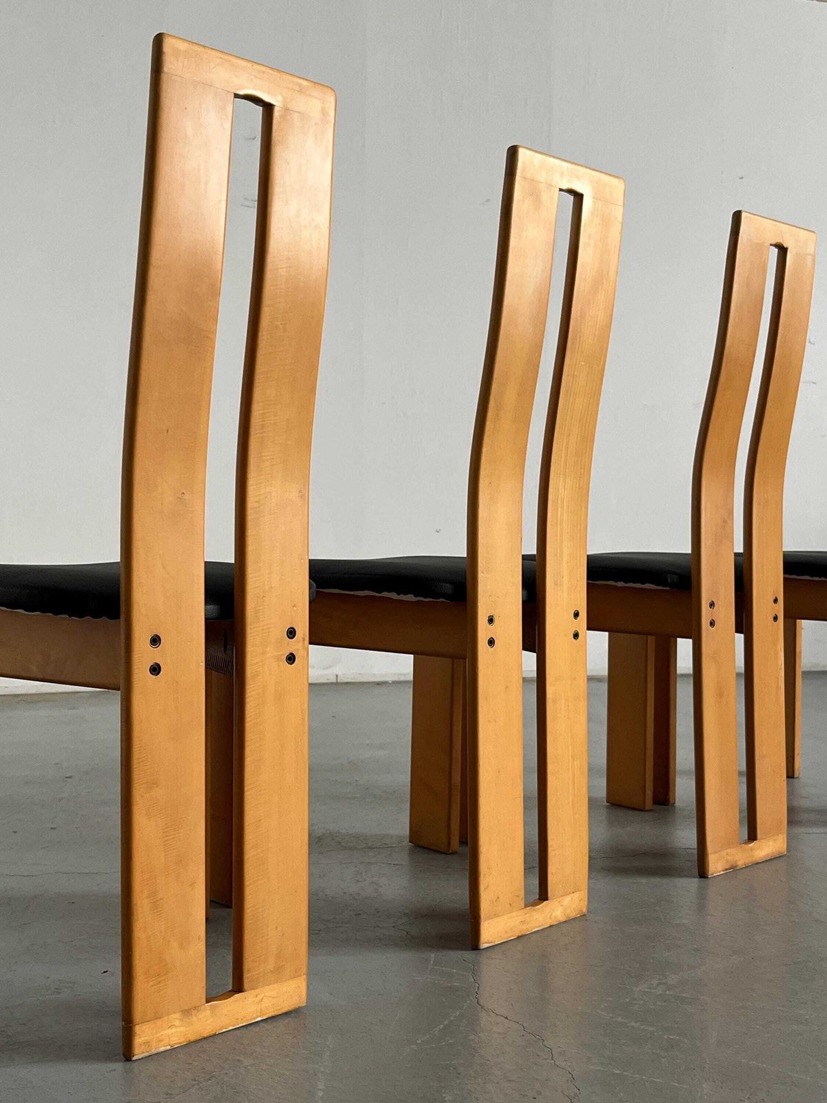 Set Of Four High Back Dining Chairs In Beechwood And Black Faux Leather In Style Of Pietro Constantini, 1970s Italy photo vinterior
