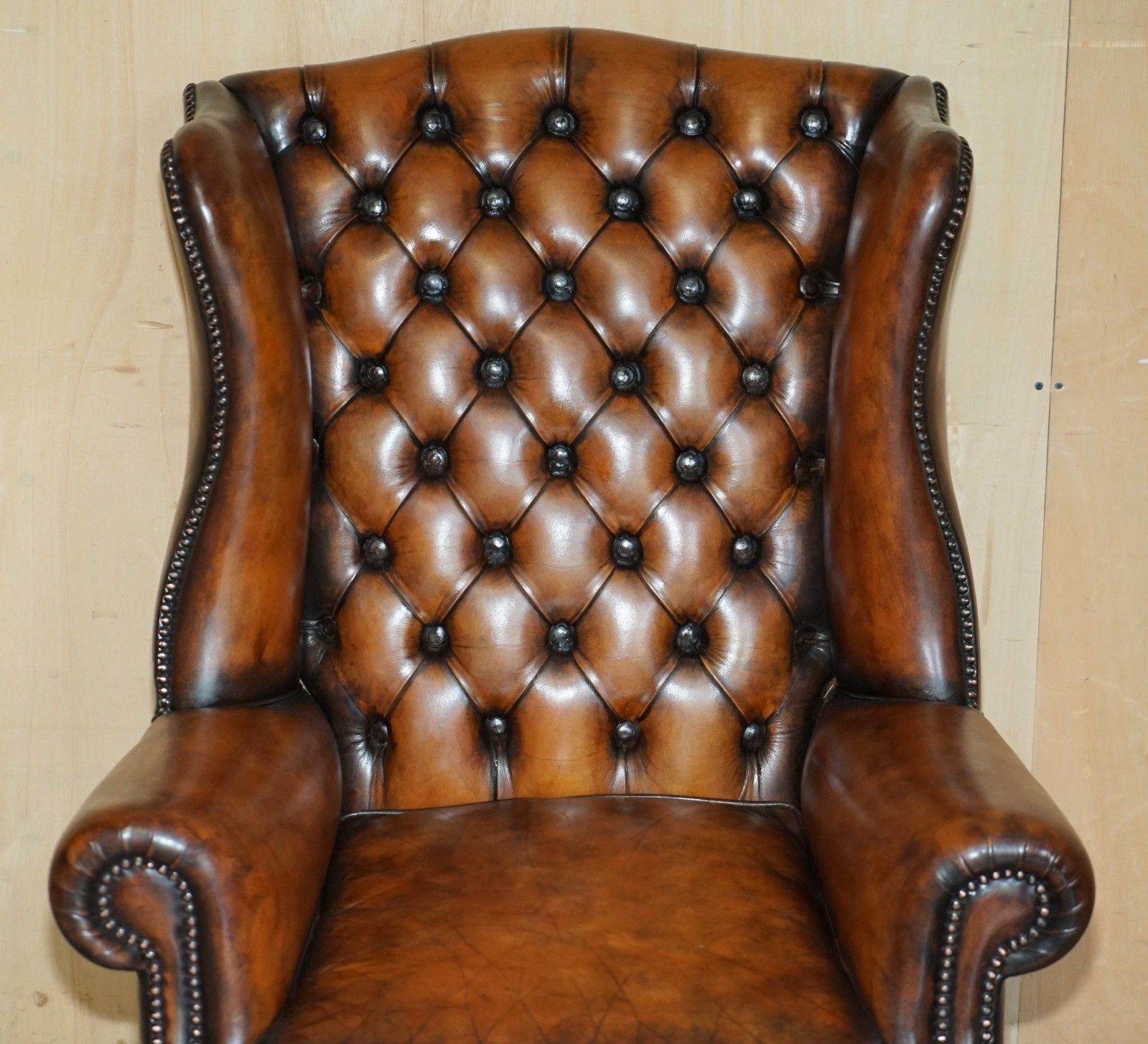 Comfortable Restored Whiskey Brown Leather Tufted Chesterfield Wingback Armchair photo Furniture