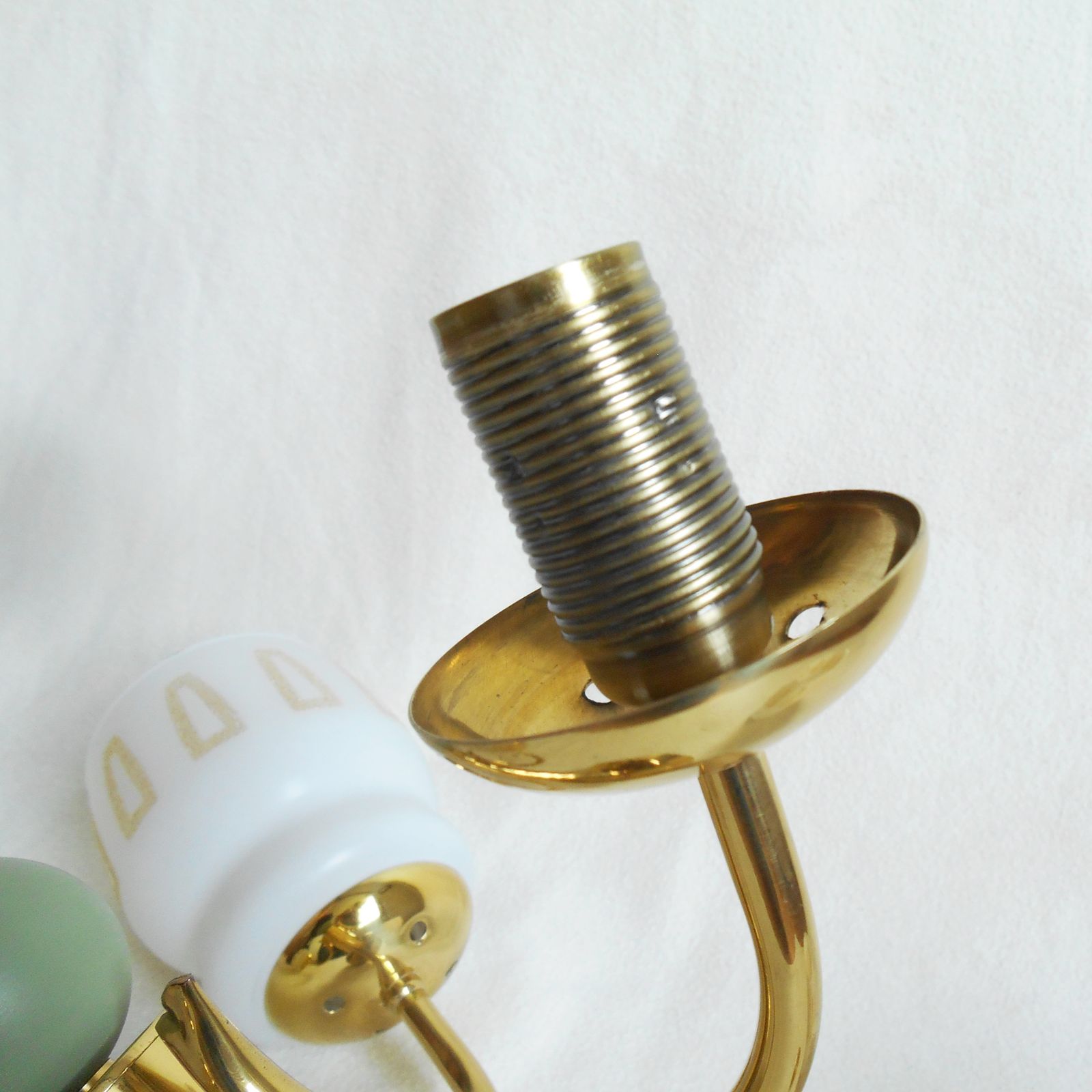 A Mid Century Modern Three Armed Brass Chandelier With Frosted Glass Shades photo furniture