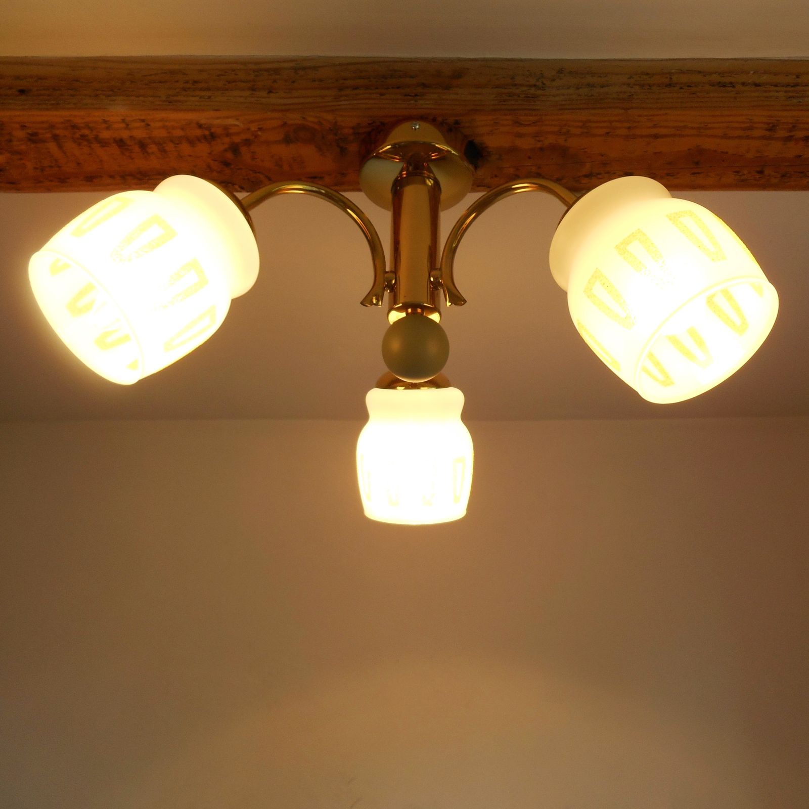 A Mid Century Modern Three Armed Brass Chandelier With Frosted Glass Shades photo vinterior