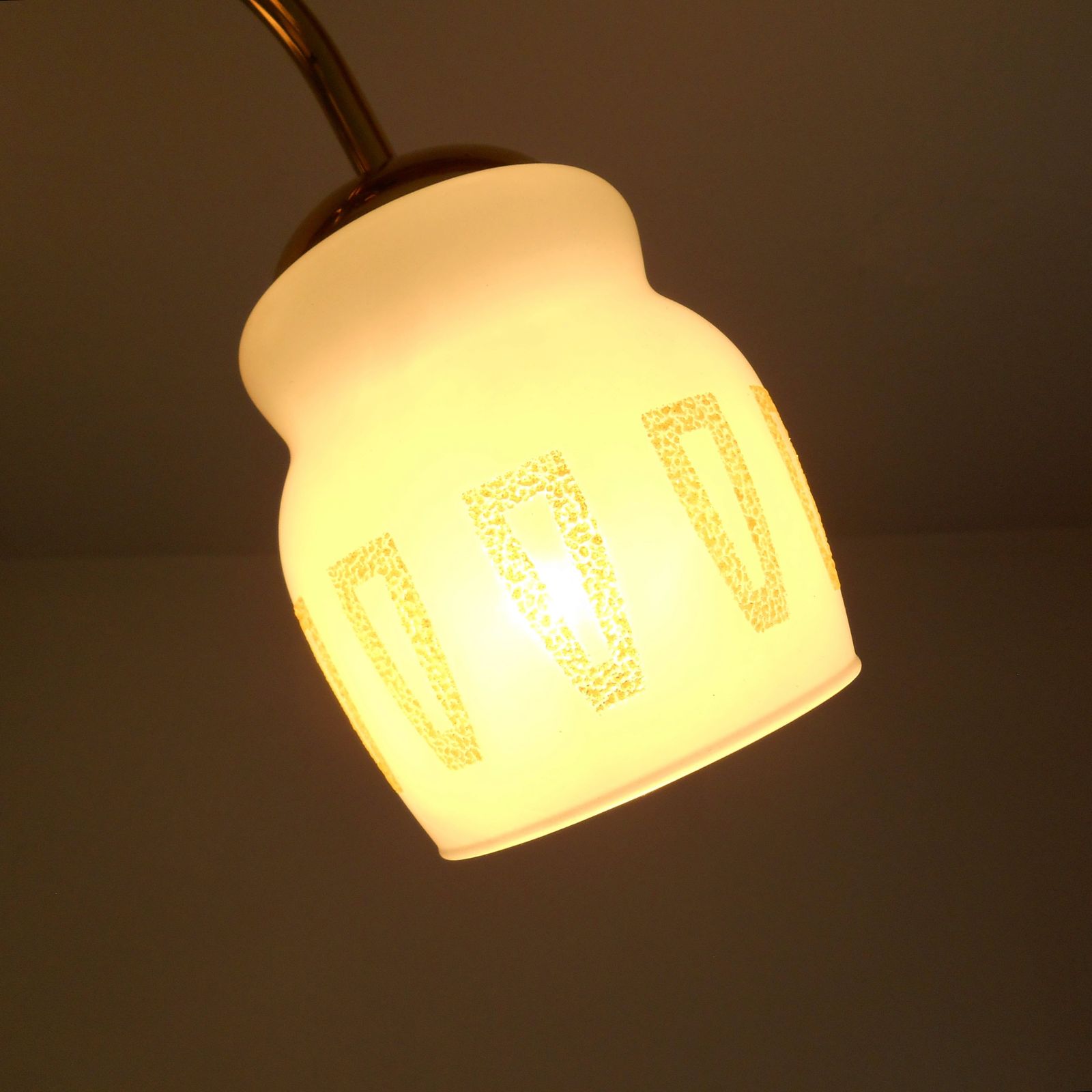 Lighting A Mid Century Modern Three Armed Brass Chandelier With Frosted Glass Shades photo