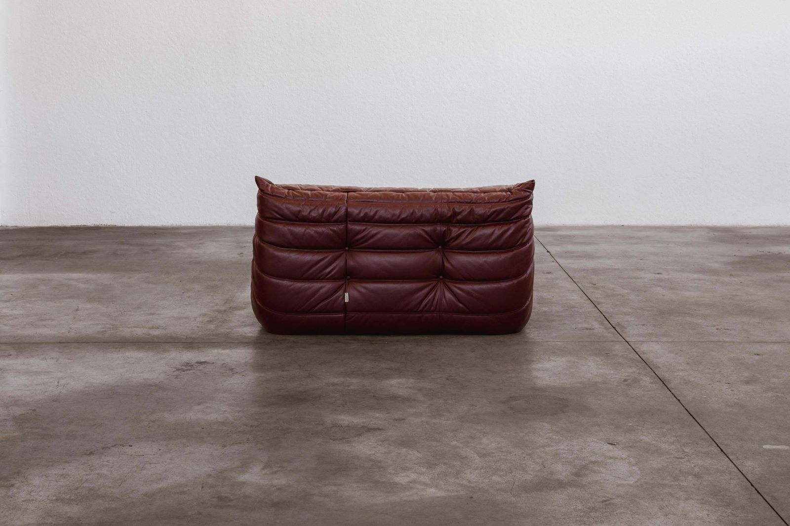 photo for sale Michel Ducaroy “Togo” Two Seater Sofa For Ligne Roset, Burgundy Leather, 1973