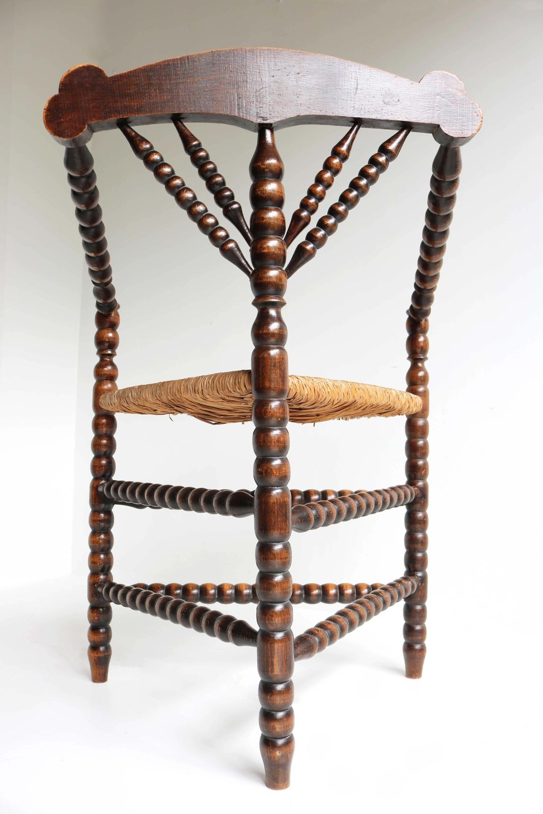 photo vintage Antique Dutch Triangular Turned Bobbin Corner Chair Rush Seat Knitting Armchair