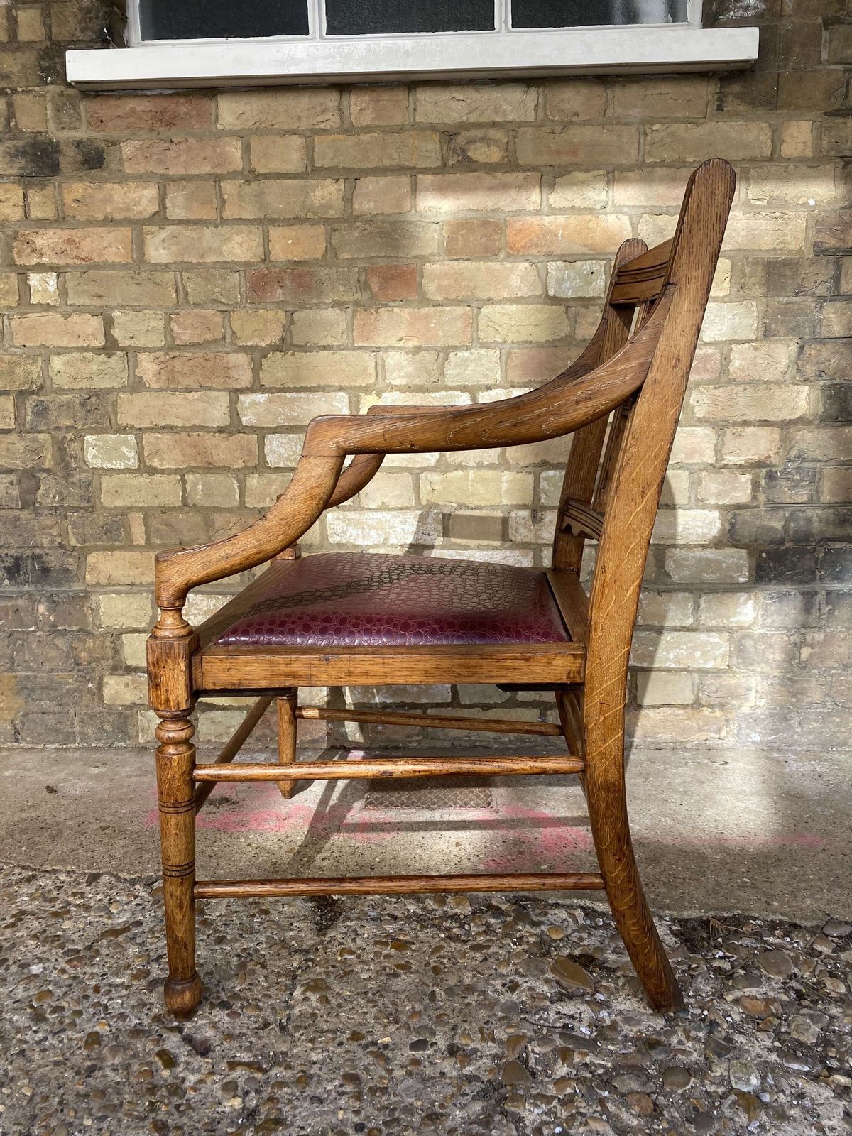 photo furniture An Aesthetic Movement Oak Armchair Circa 1890