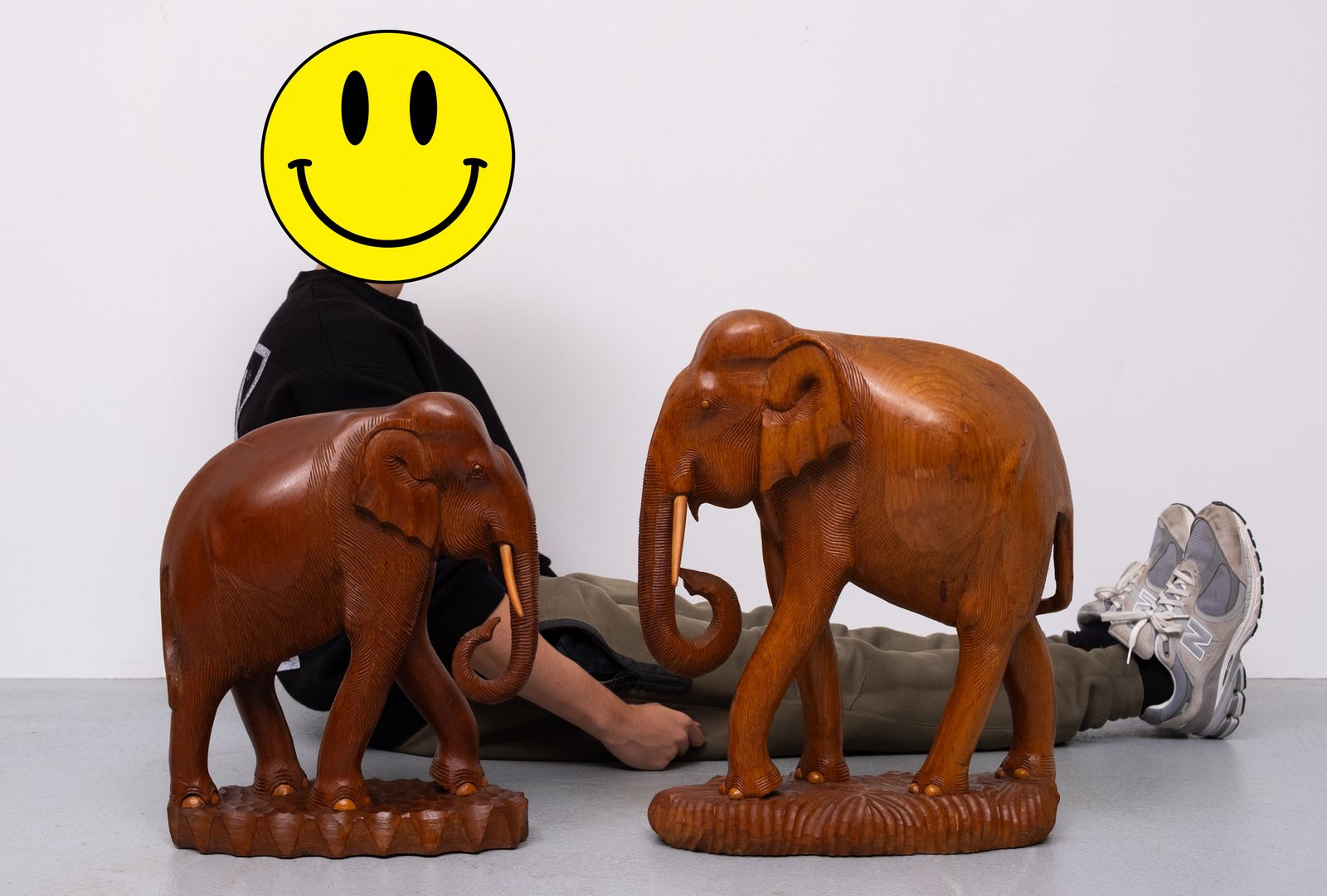 Large Carved Teak Elephant Statues Together With A Smaller Elephant 1950s photo furniture