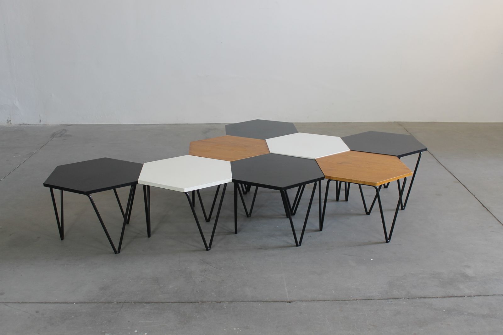 photo for sale Gio Ponti Set Of Eight Hexagonal Coffee Tables In Wood And Metal I.S.A. 1950s