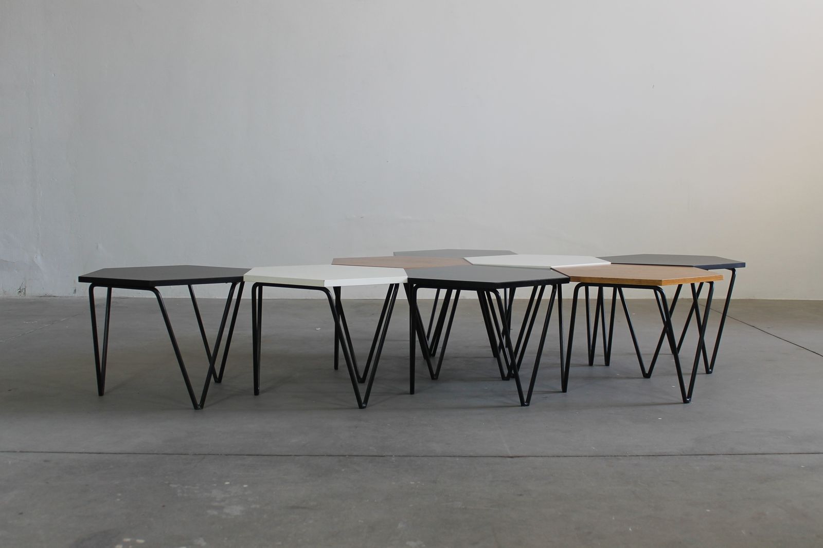 photo furniture Gio Ponti Set Of Eight Hexagonal Coffee Tables In Wood And Metal I.S.A. 1950s