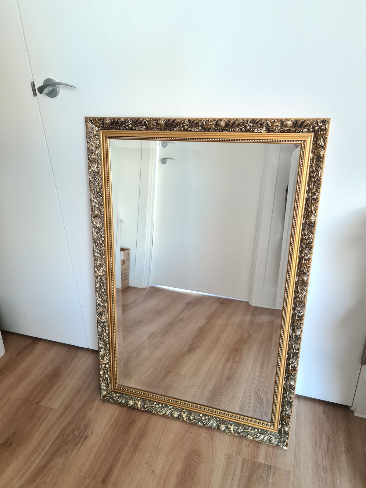 1980s British Neoclassical Gilt Wood Bevelled Wall Mirror Dahlia Hand Carved Frame