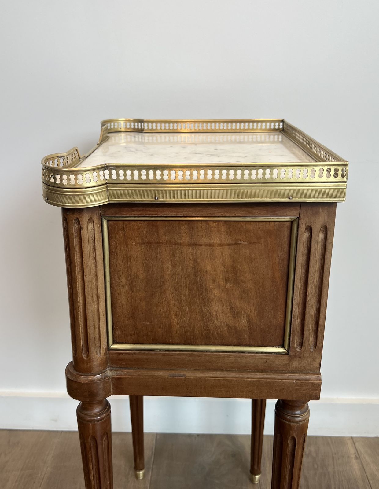 photo furniture Pair Of Mahogany And Brass End Tables Or Bedside Tables With Carrara Marble Tops In The Style Of Maison Jansen. Circa 1940