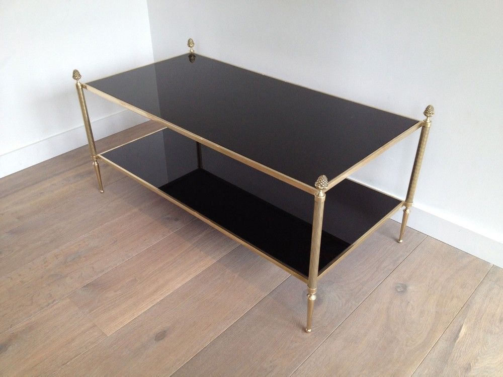 photo furniture Neoclassical Style Coffee Table In Bronze And Brass With Double Black Lacquered Glass Tops From Maison Baguès