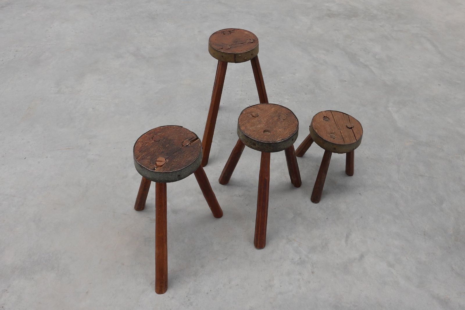 photo for sale Vintage Brutalist French Oak Tripod Stools With Metal Rim, 1850s, Set Of 4